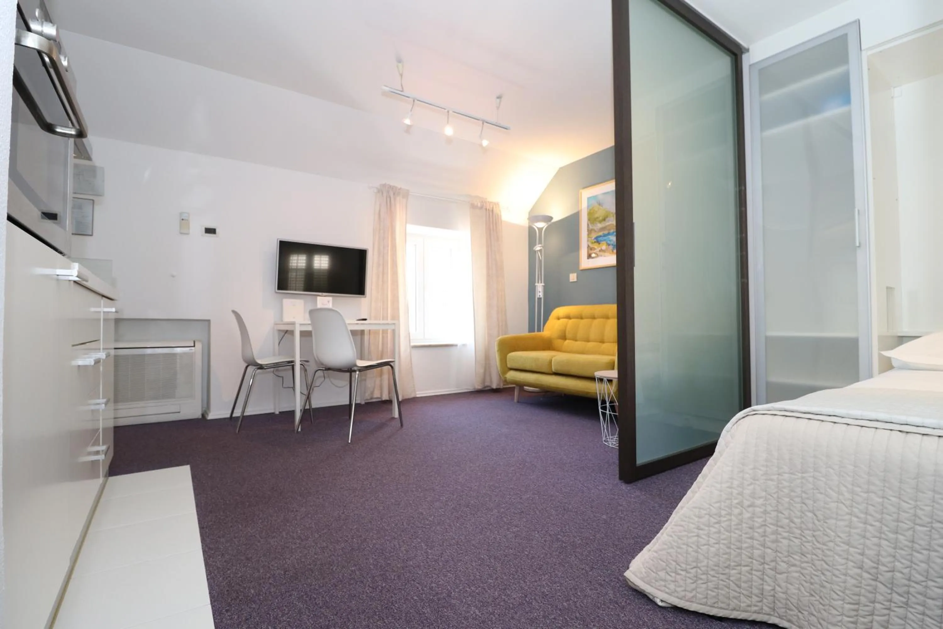 Dining area, Bed in Miró Studio Apartments Dubrovnik