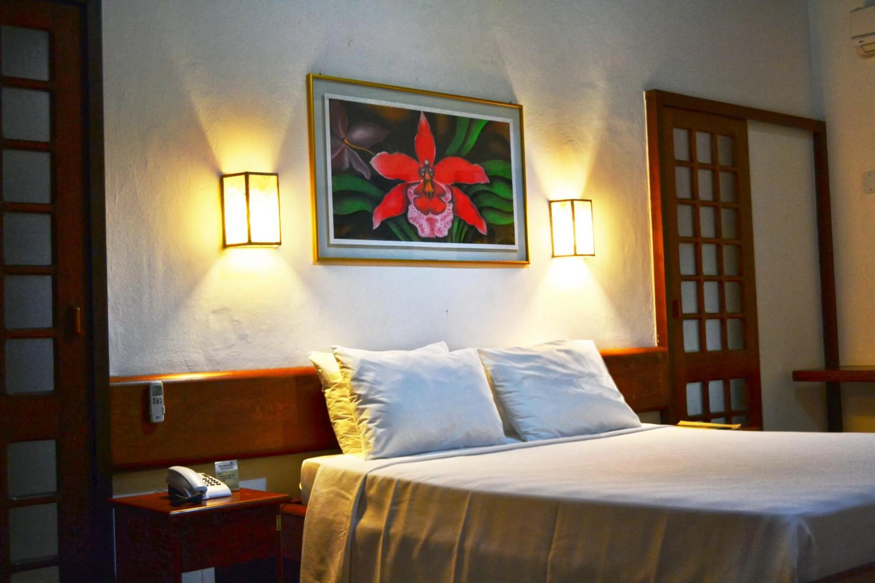 Bedroom, Bed in Arraial Bangalô Praia Hotel