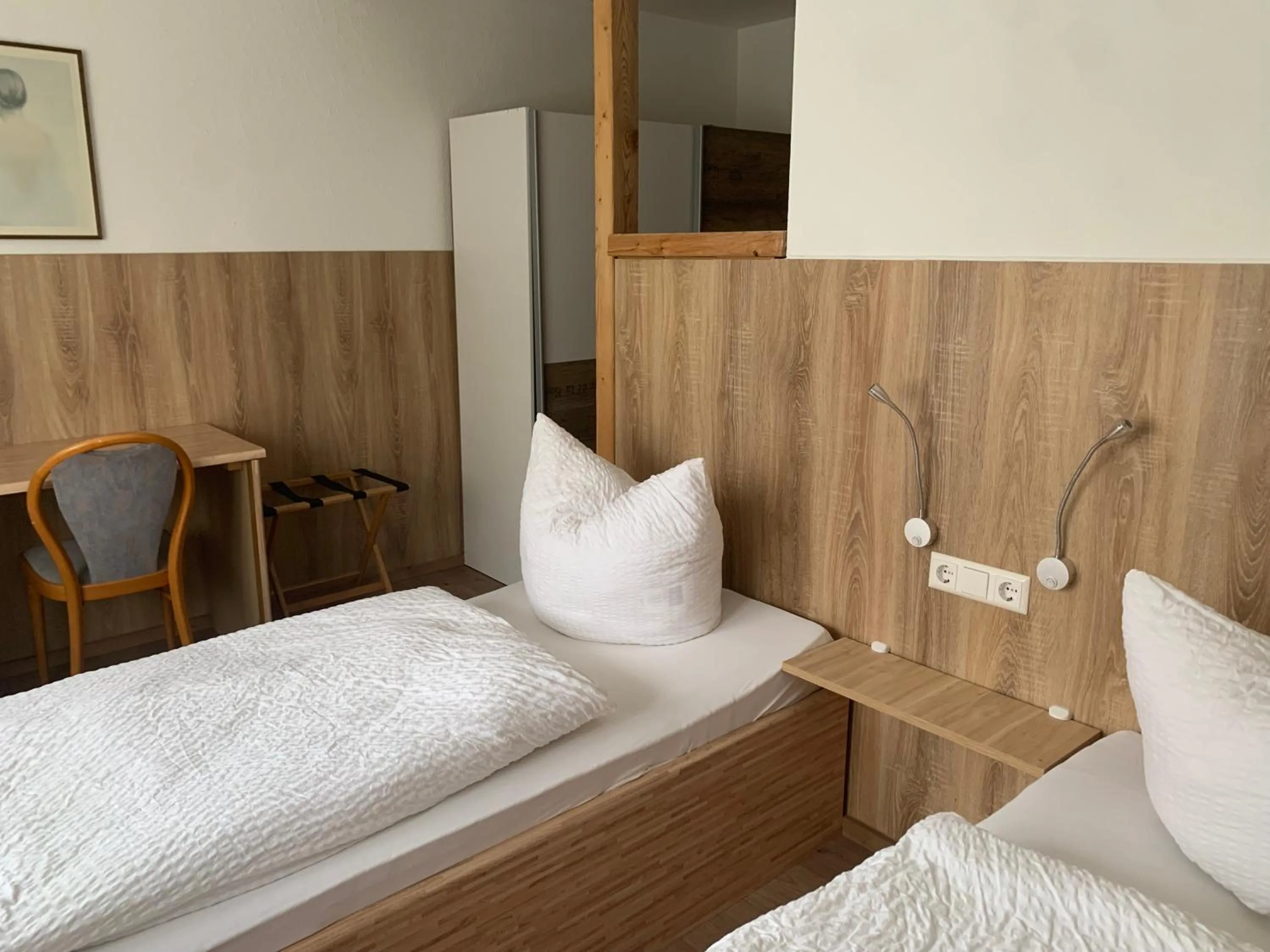 Bed in Hotel Schweizerhof