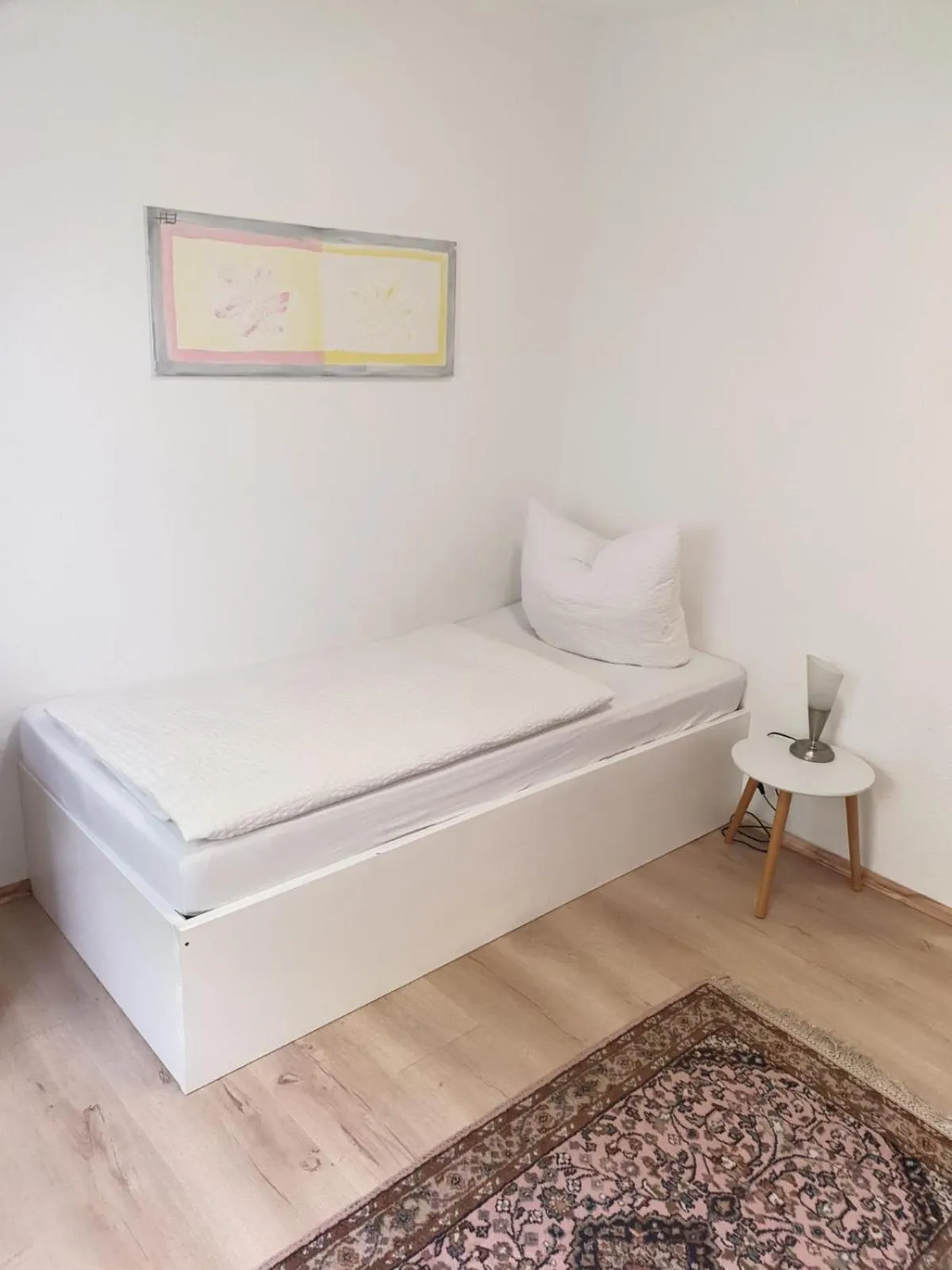 Bed in Hotel Schweizerhof