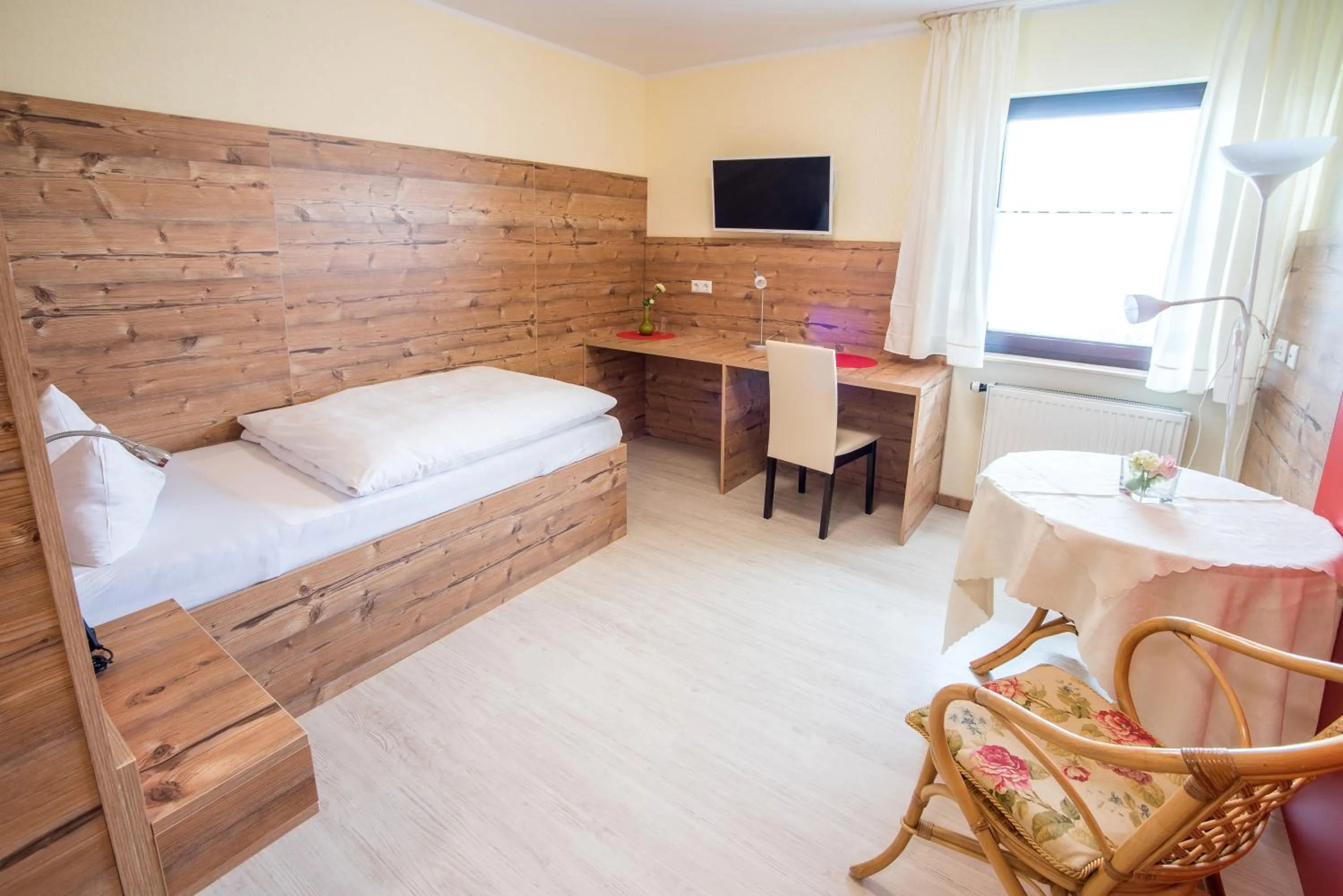 Photo of the whole room, Bed in Hotel Schweizerhof