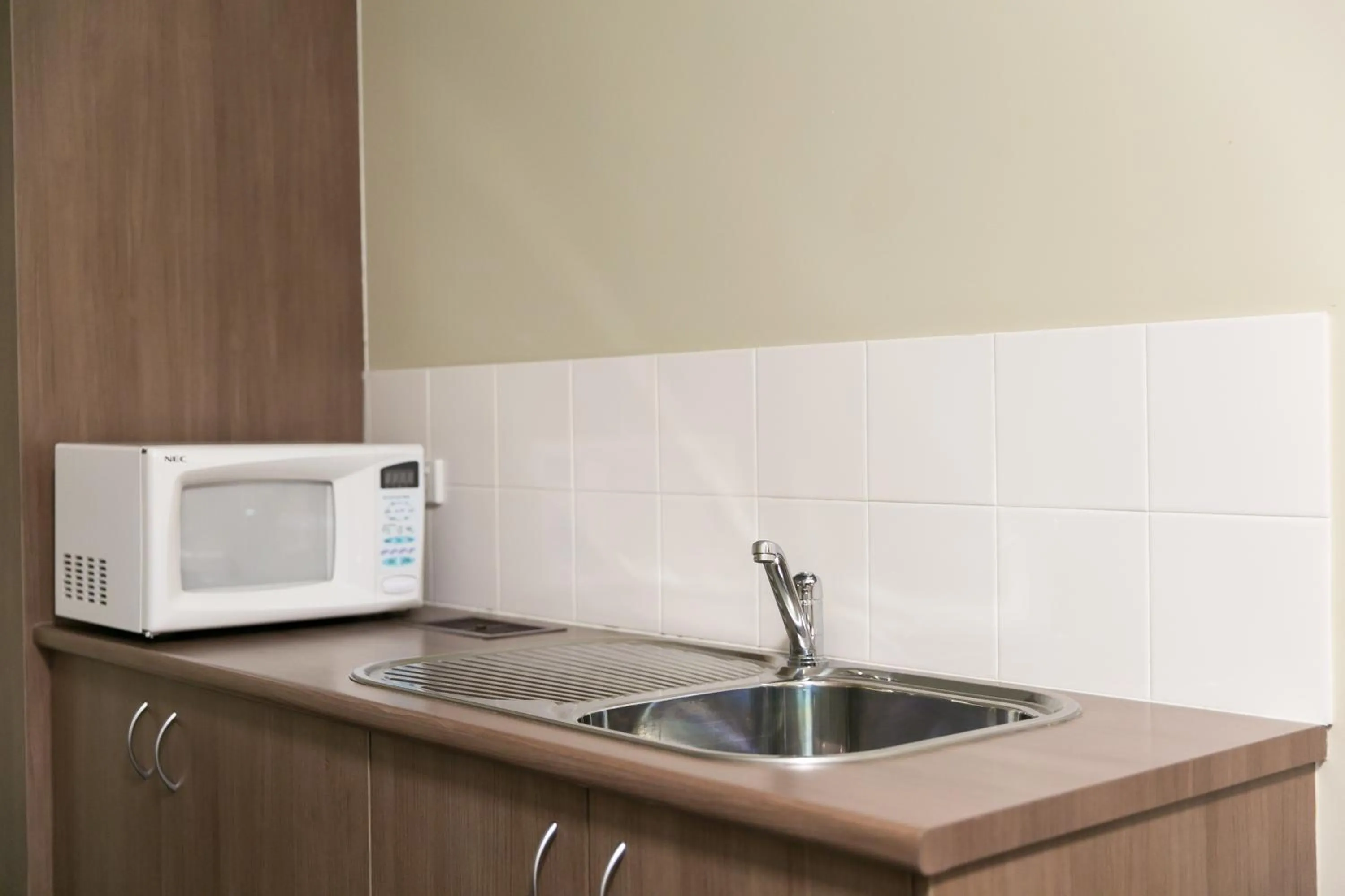 Kitchen or kitchenette in Cessnock Motel