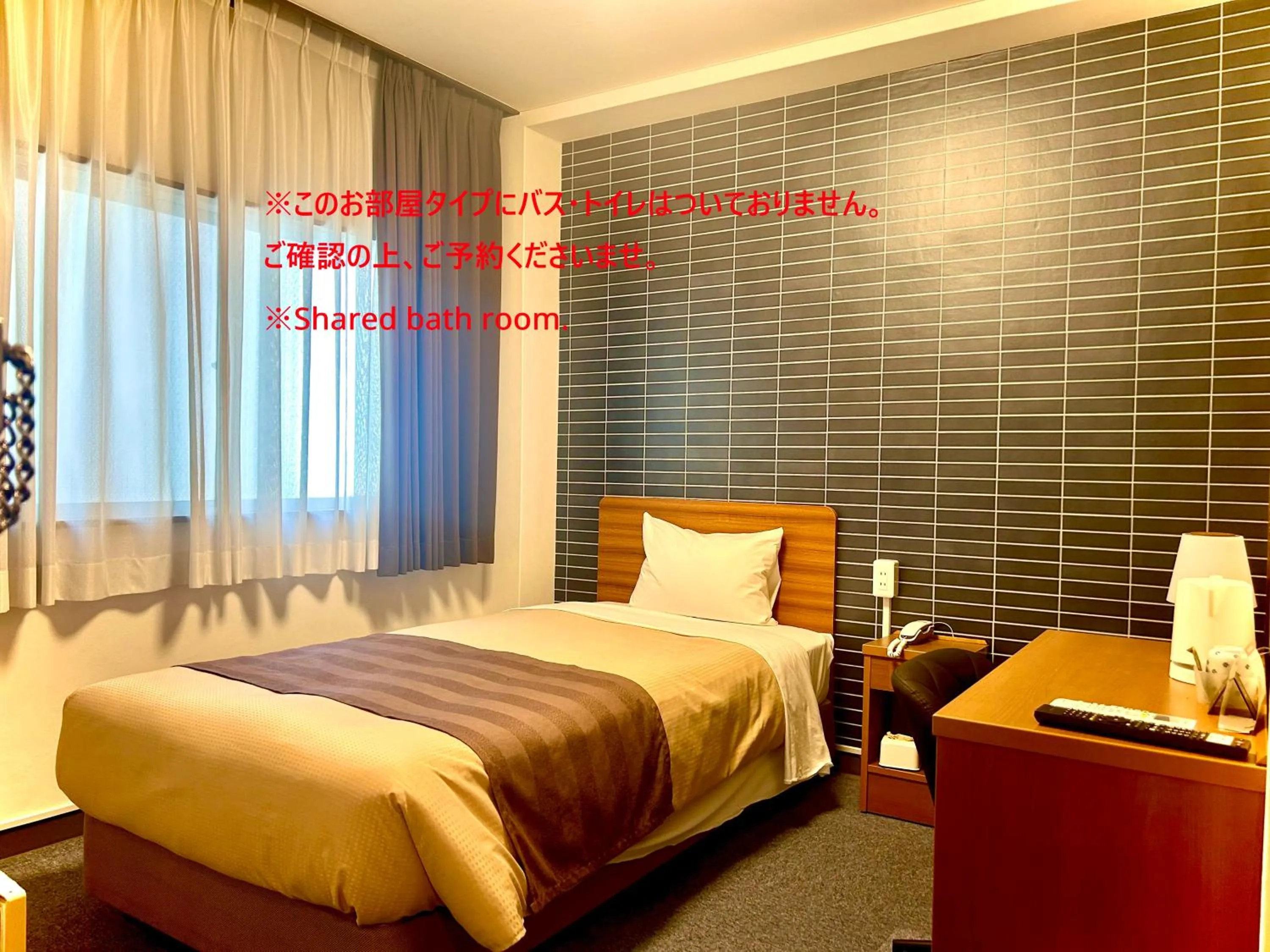 Bed in Tokyo Ueno New Izu Hotel