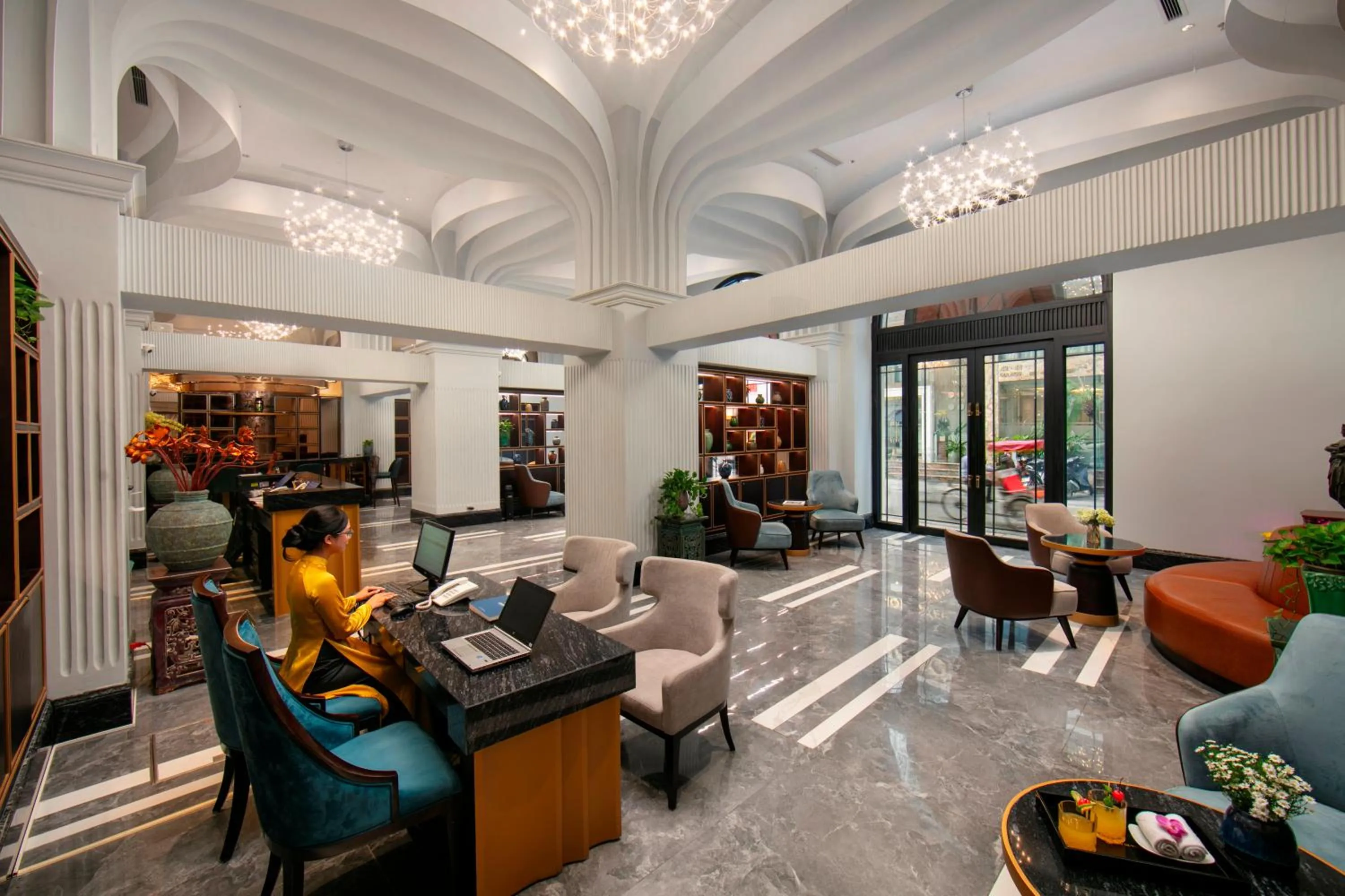 Lobby or reception in MAY DE VILLE Lakeside Hotel