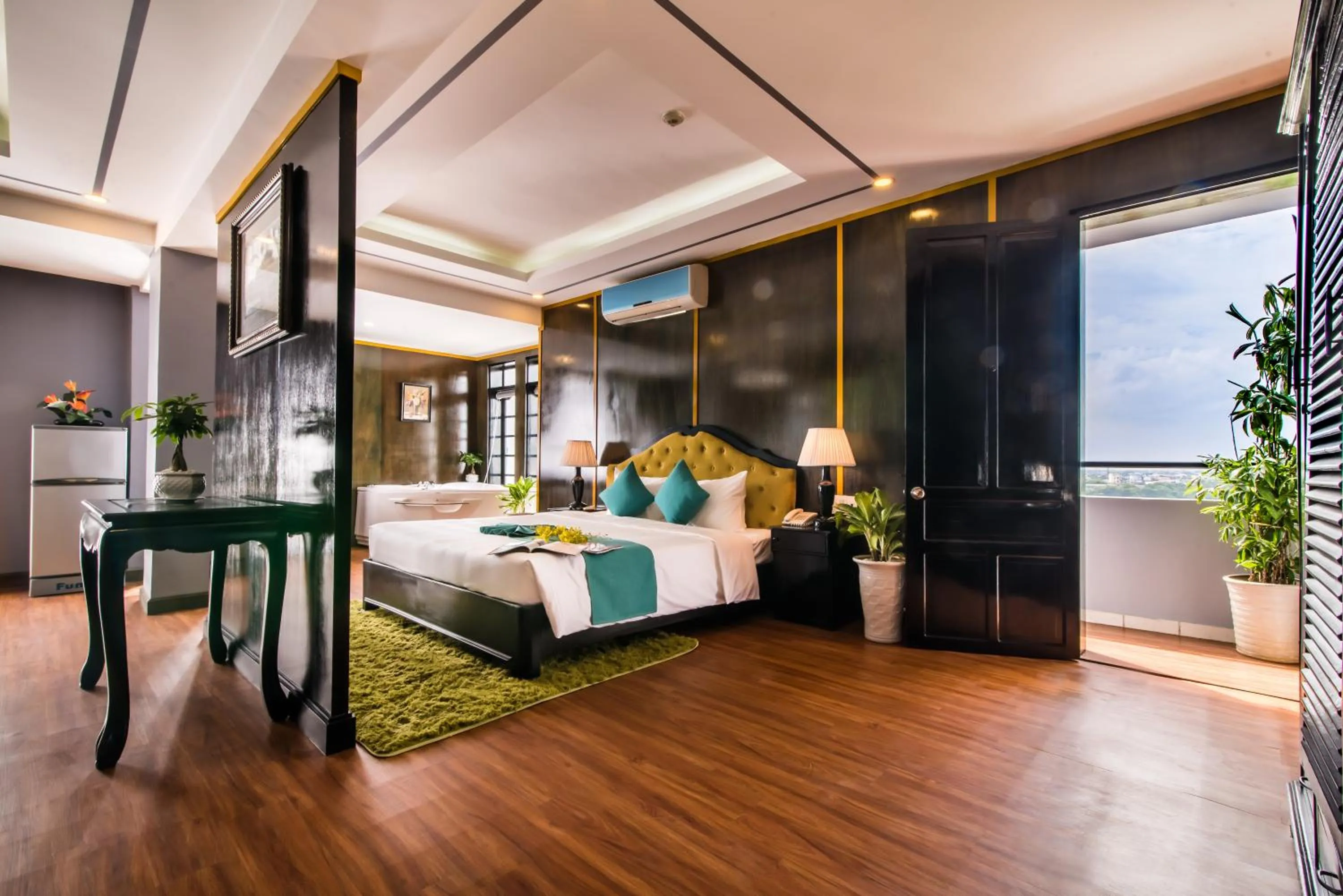 Photo of the whole room, Bed in The Sunriver Boutique Hotel Hue