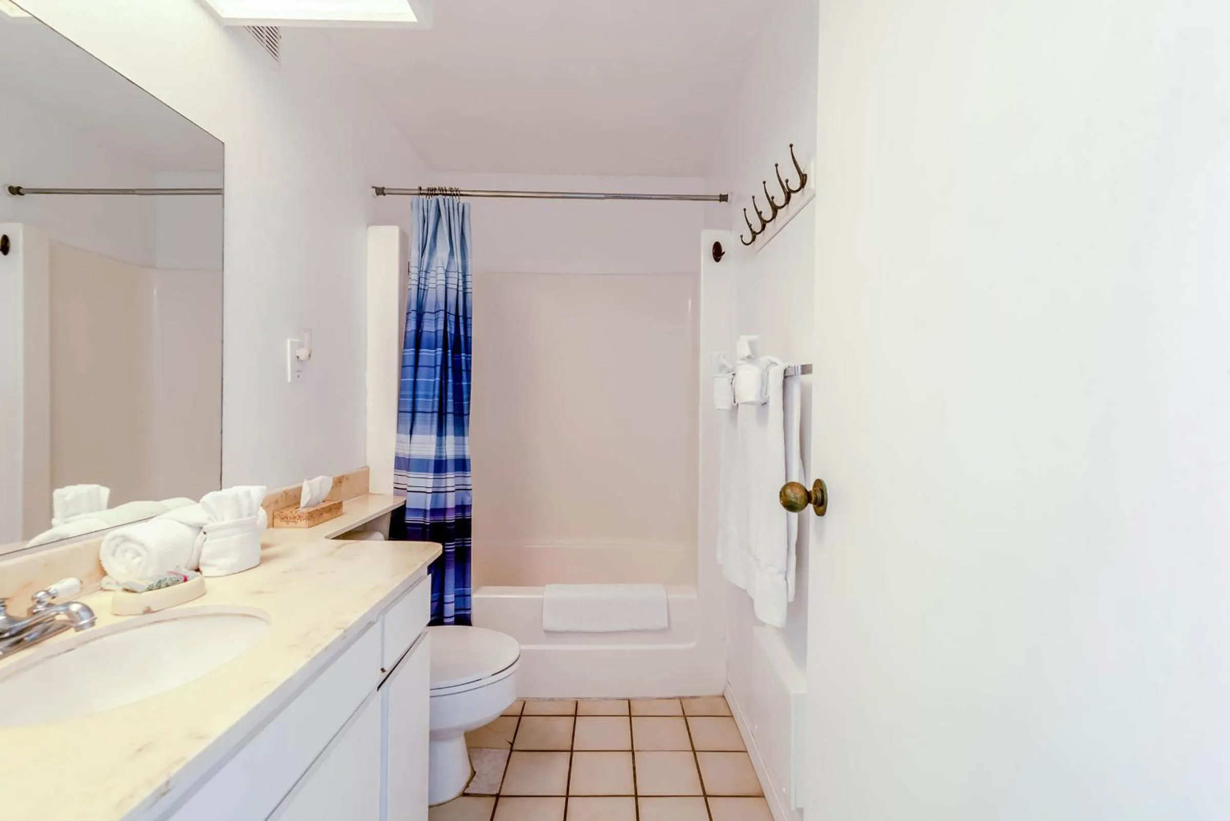 Bathroom in Capri by the Sea by All Seasons Resort Lodging