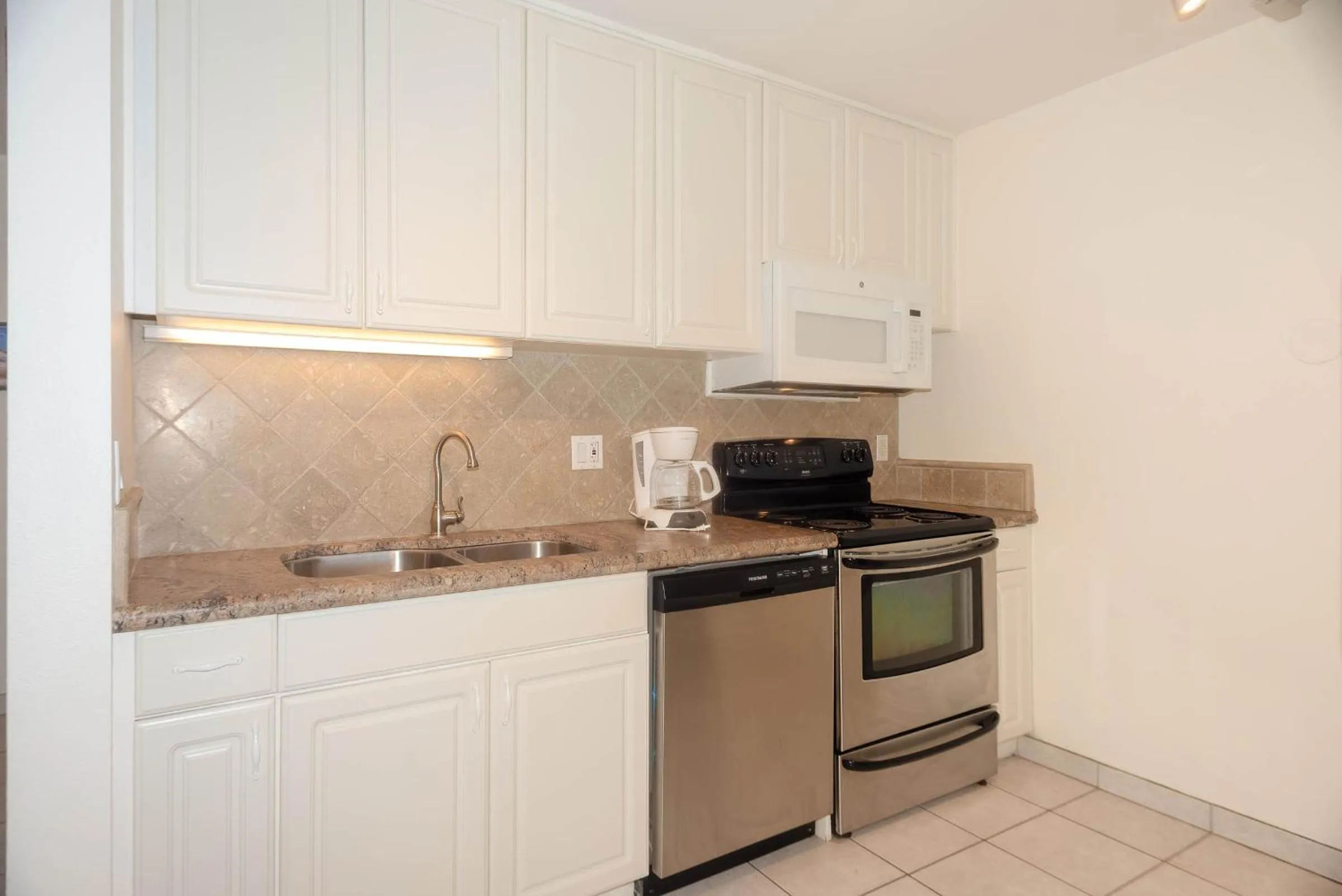 kitchen in Capri by the Sea by All Seasons Resort Lodging