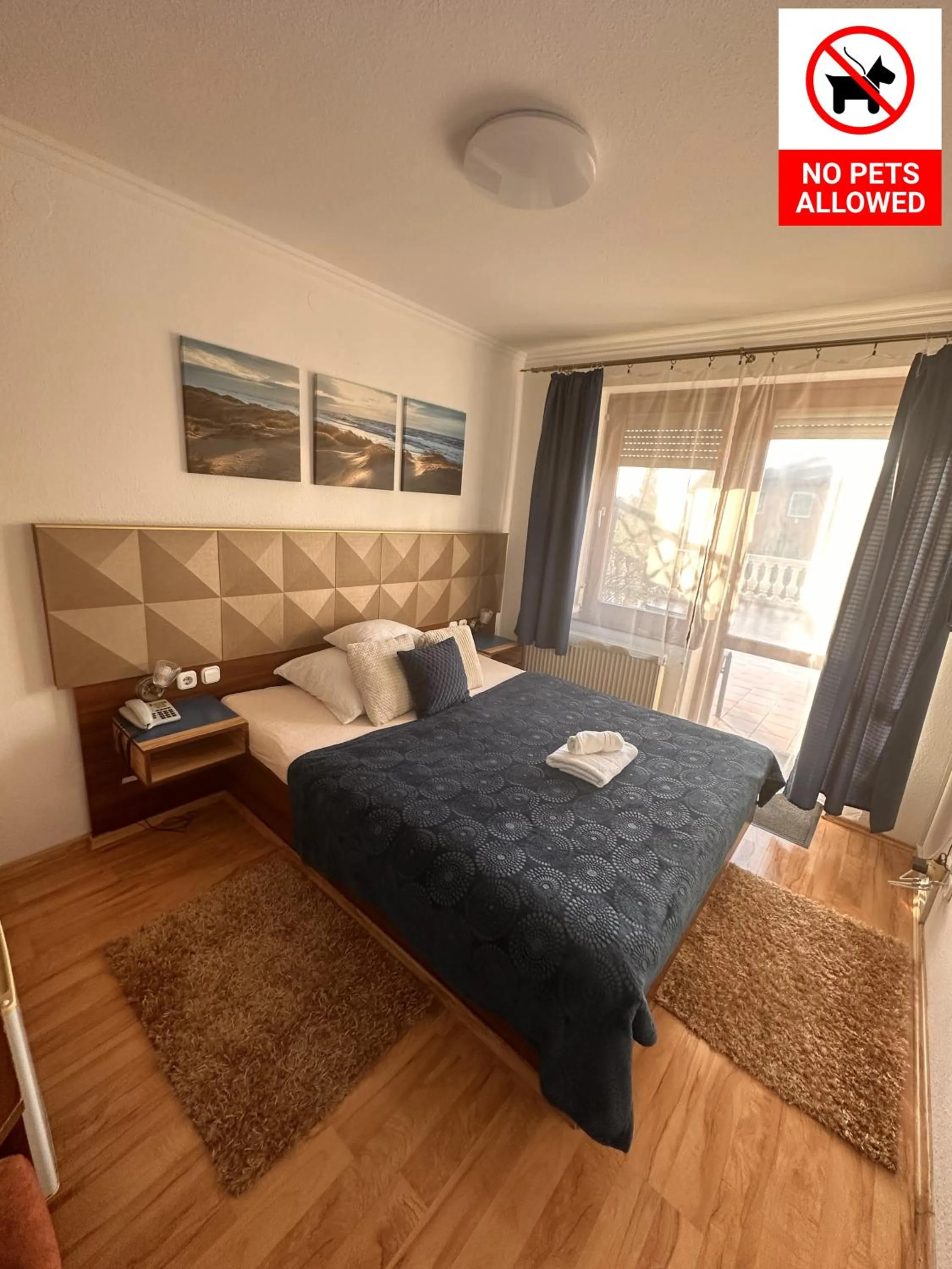 Bed in Le Rose Suites & Park Hotel