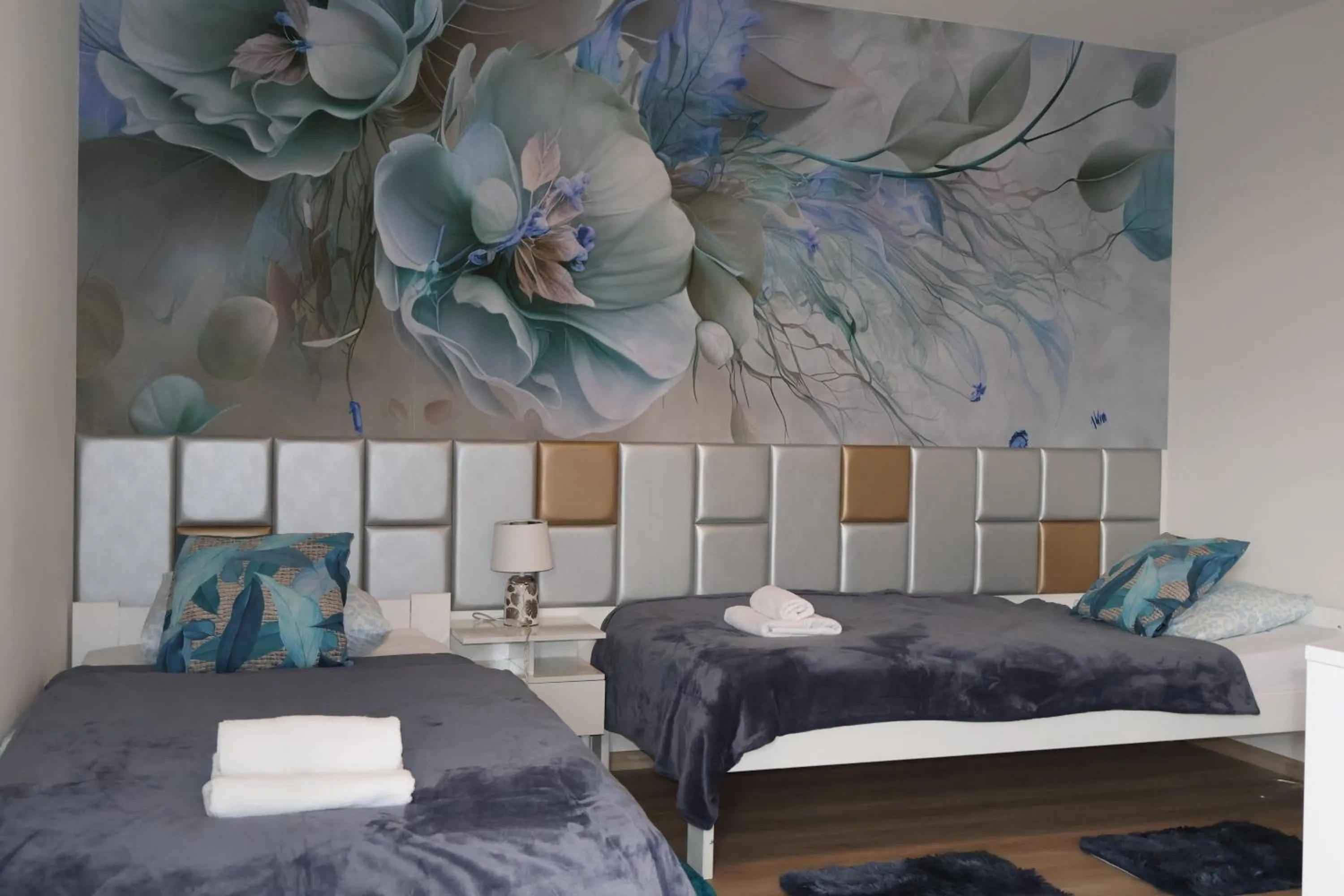 Bed in Le Rose Suites & Park Hotel