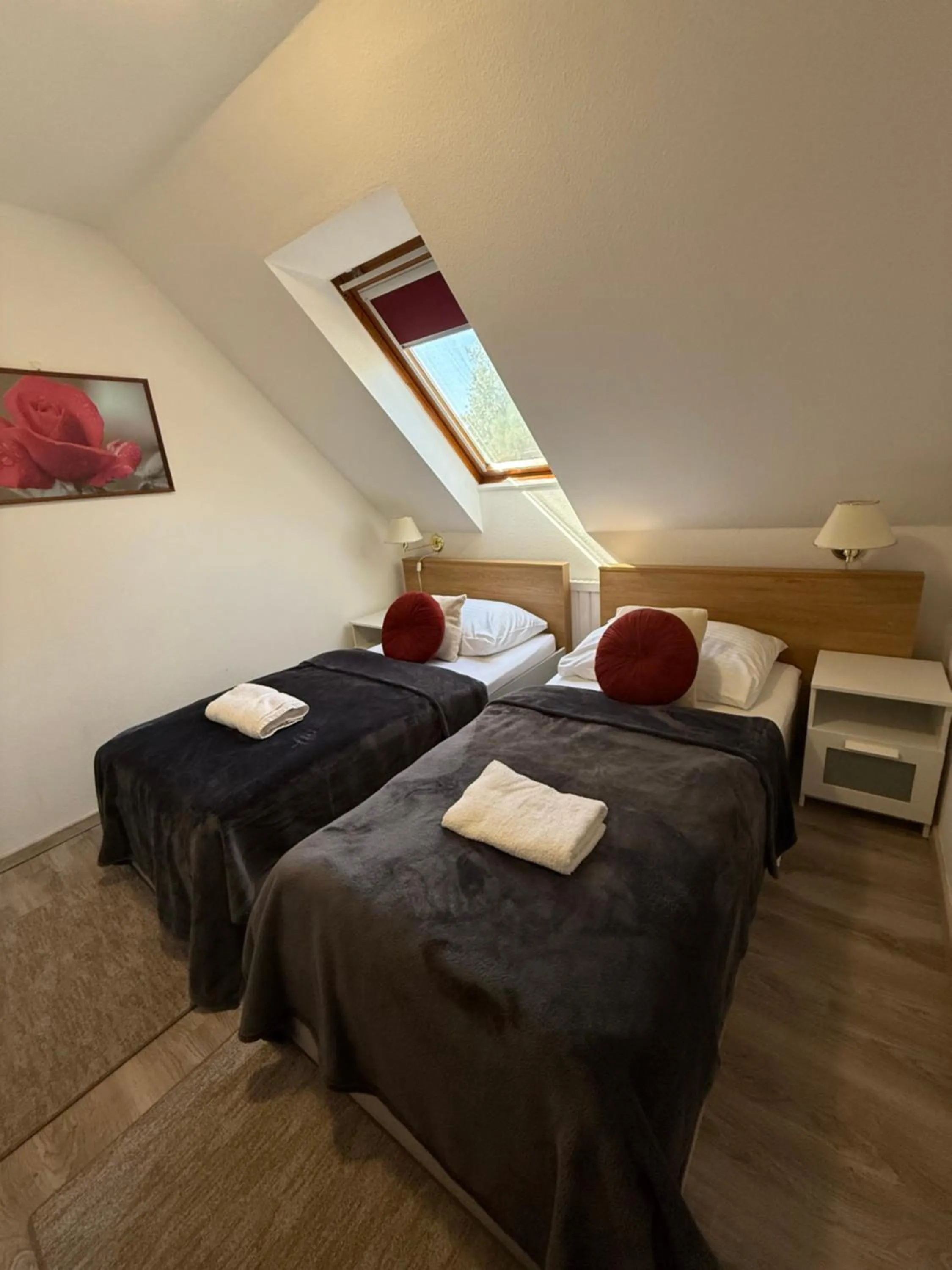 Bed in Le Rose Suites & Park Hotel