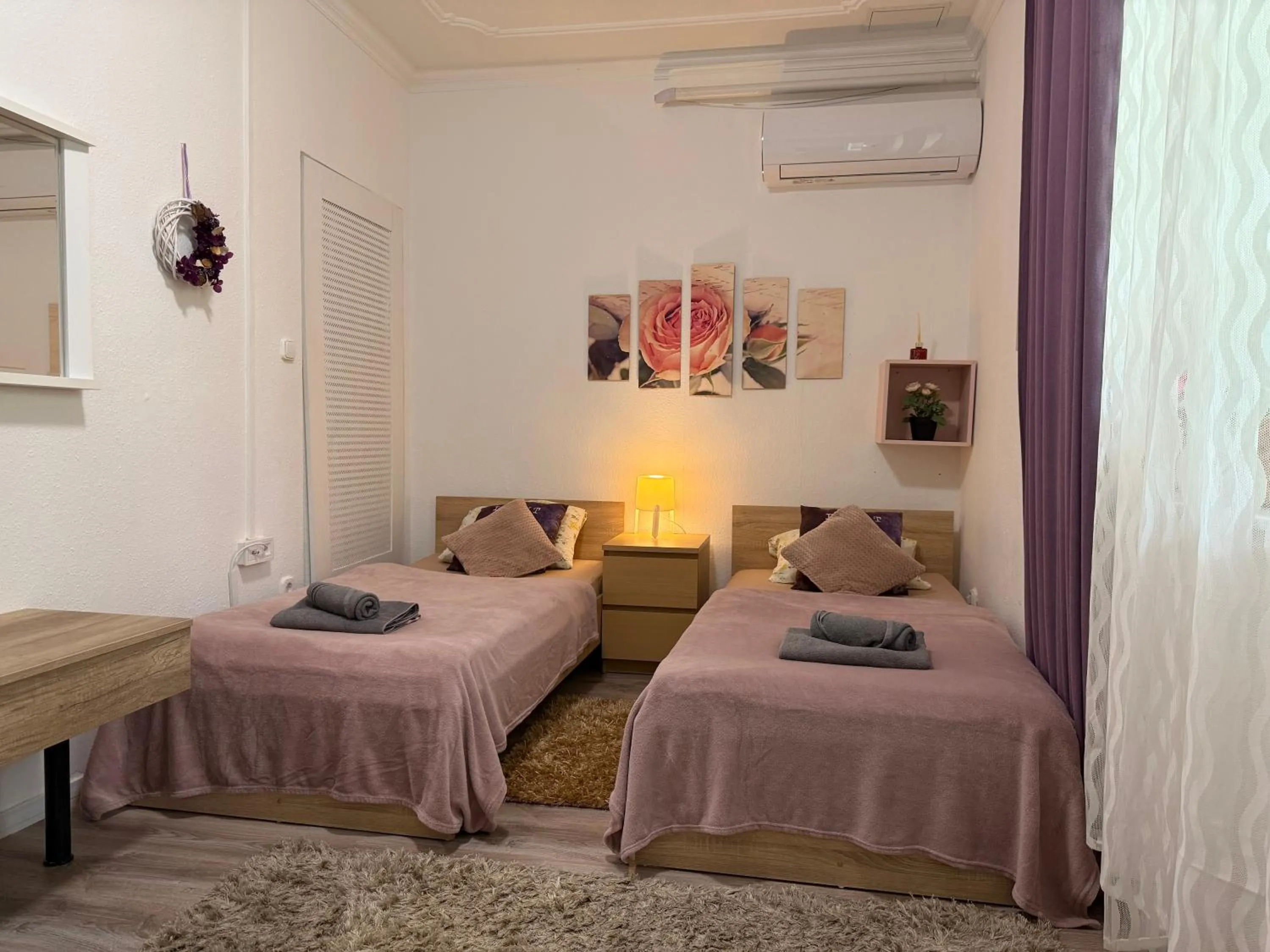 Bed in Le Rose Suites & Park Hotel