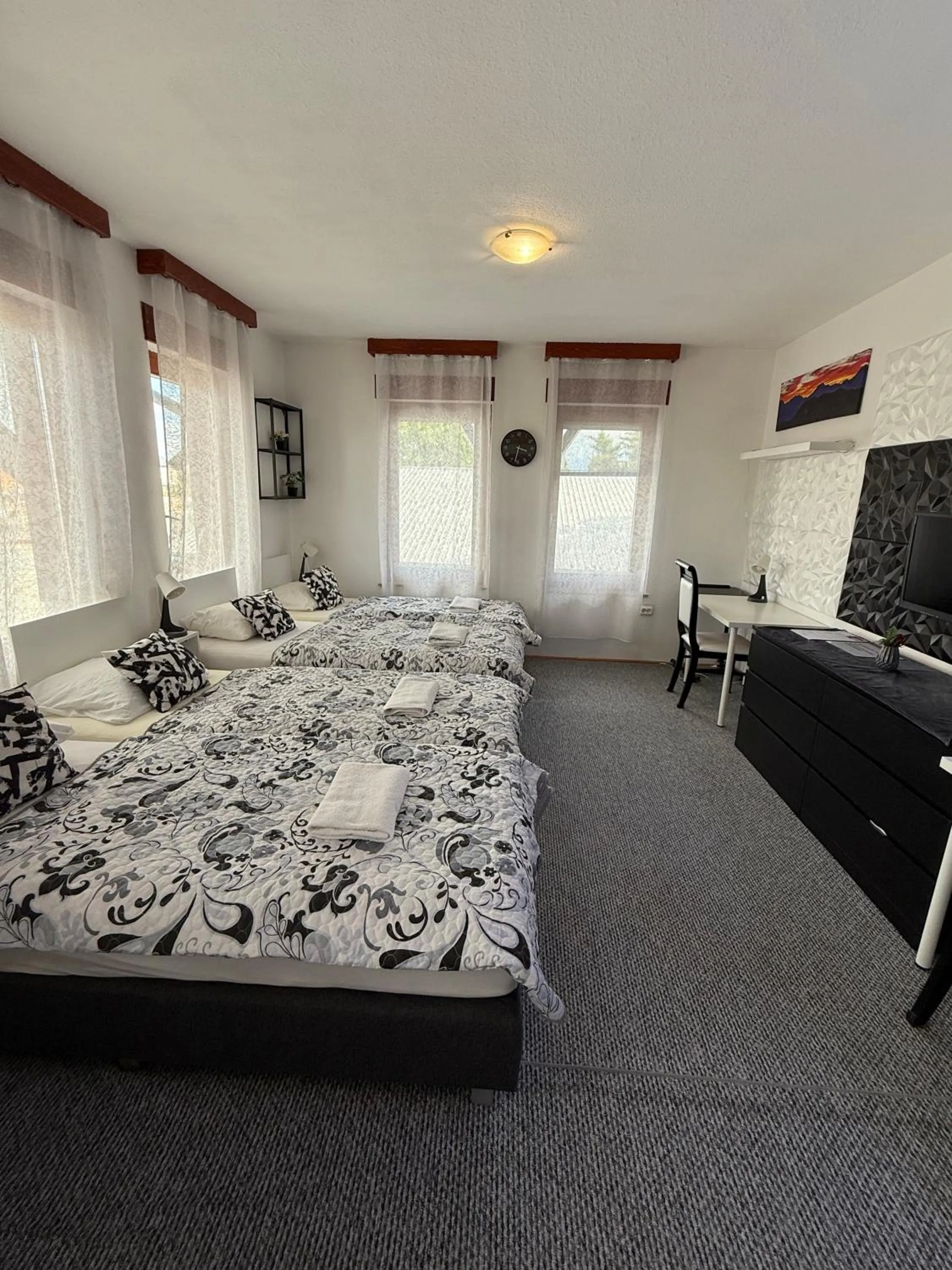 Bed in Le Rose Suites & Park Hotel