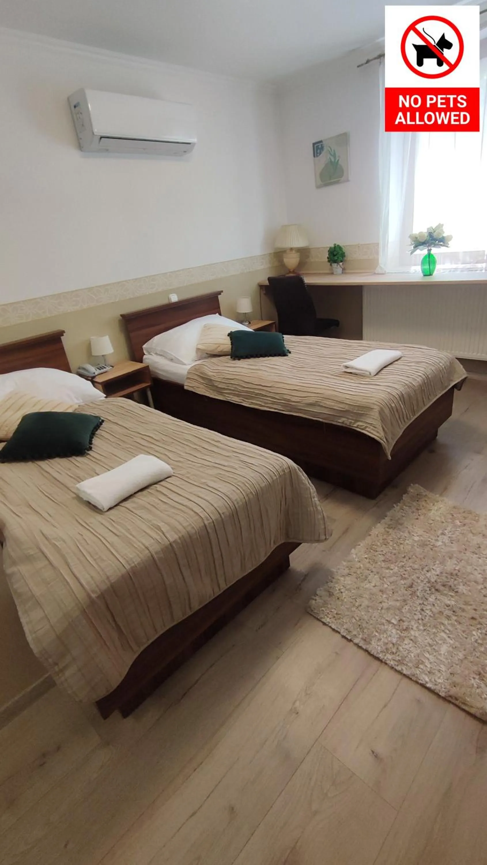 Bed in Le Rose Suites & Park Hotel