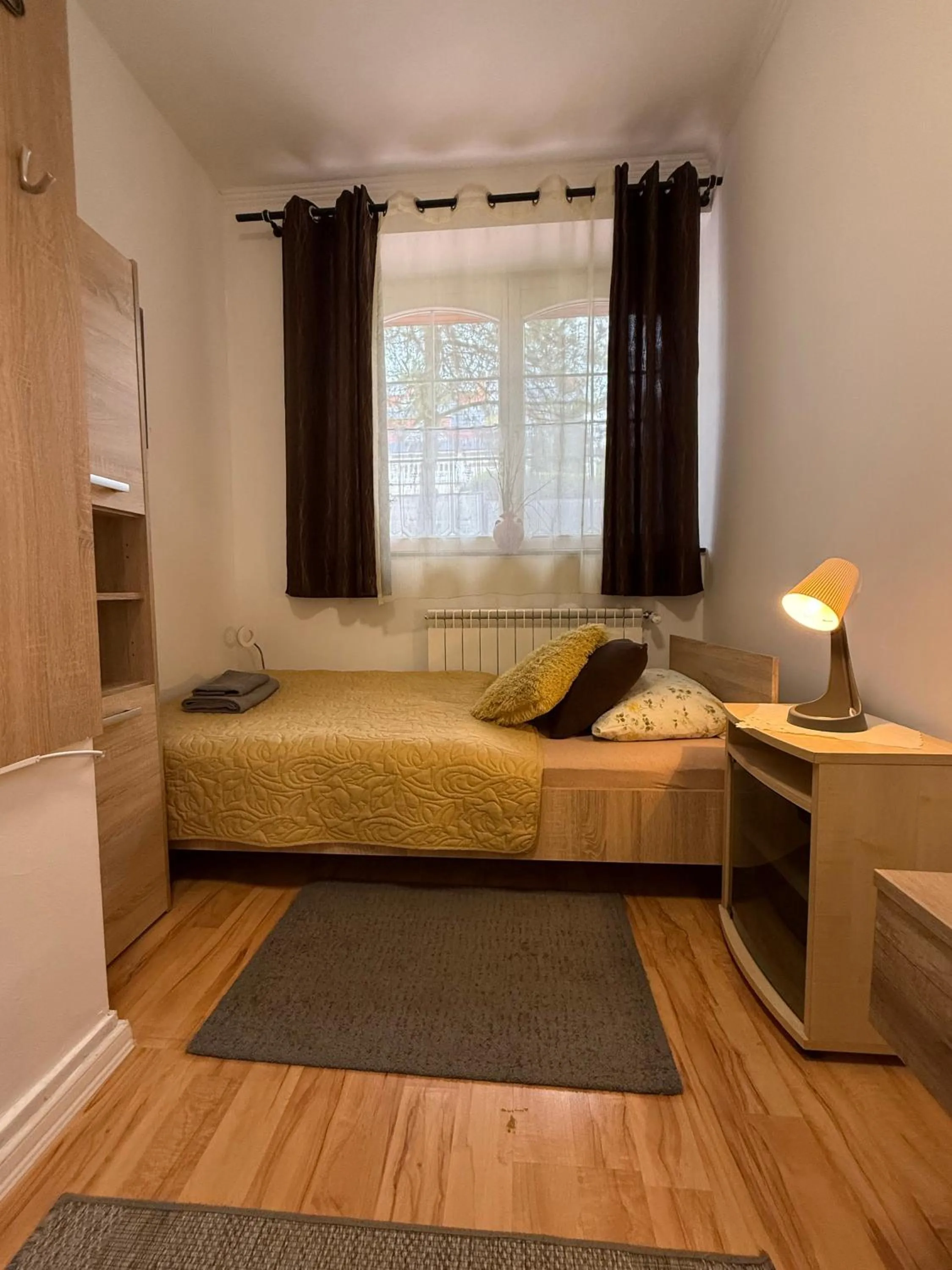 Bed in Le Rose Suites & Park Hotel