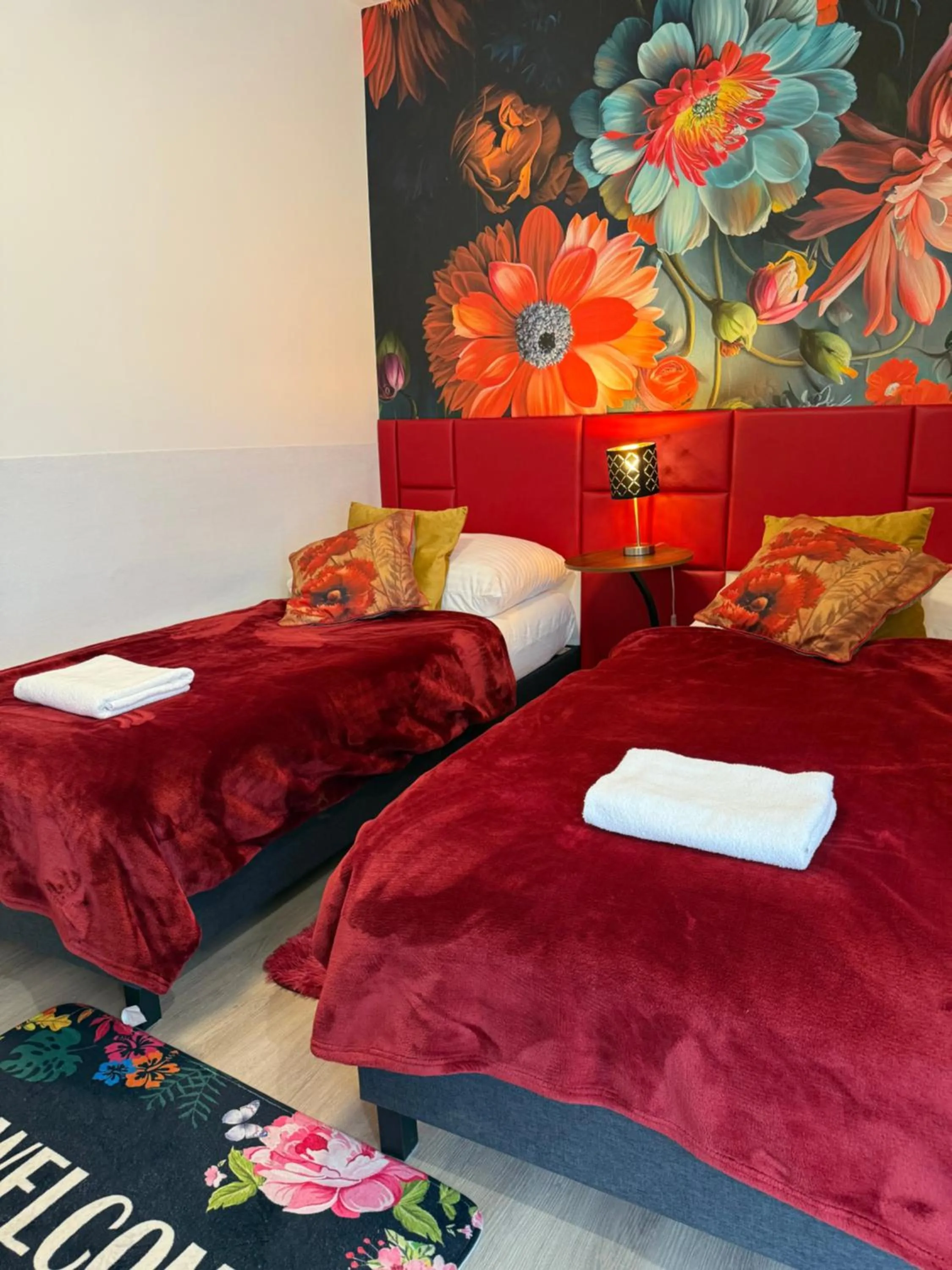 Bed in Le Rose Suites & Park Hotel