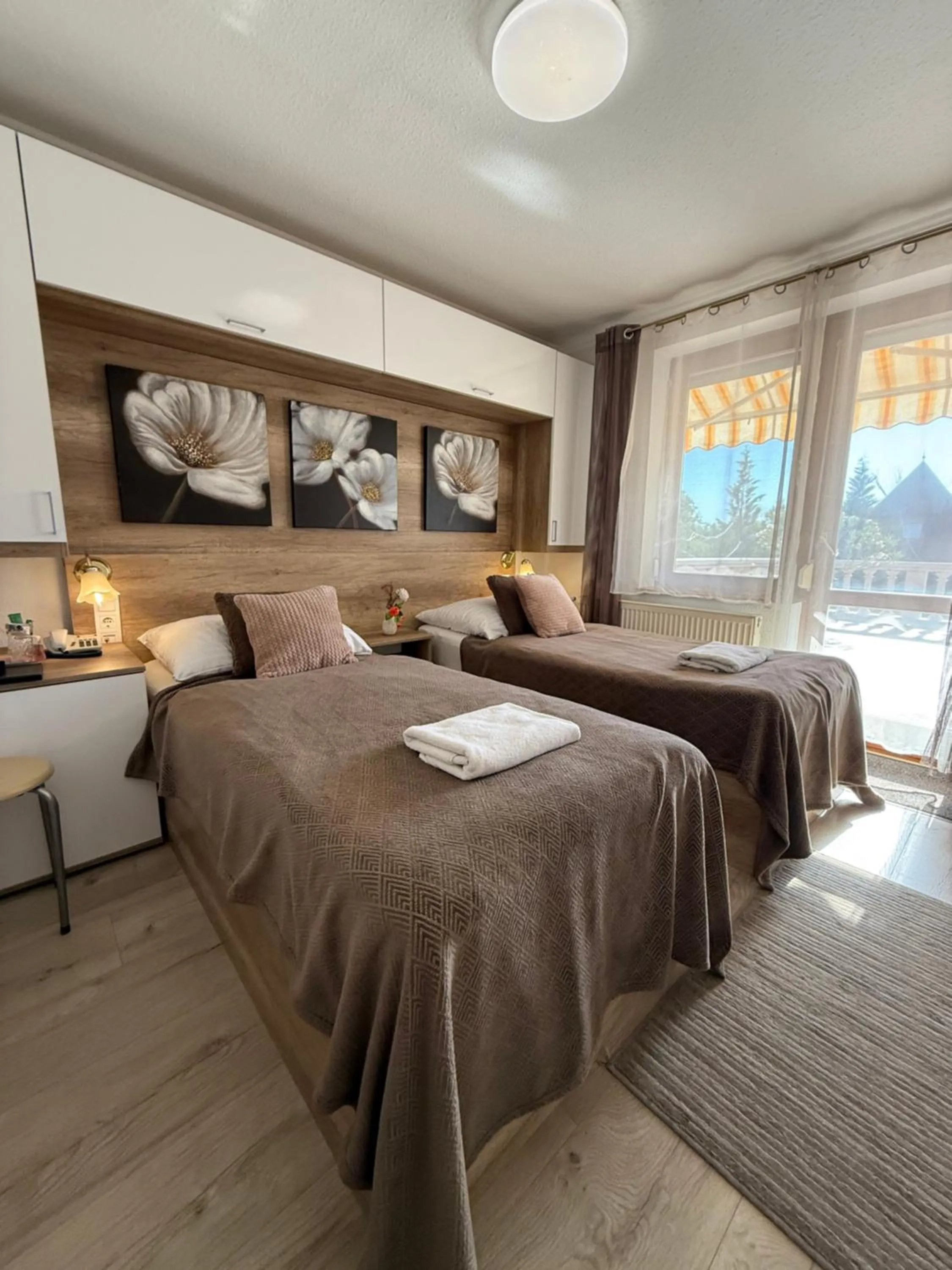 Bed in Le Rose Suites & Park Hotel