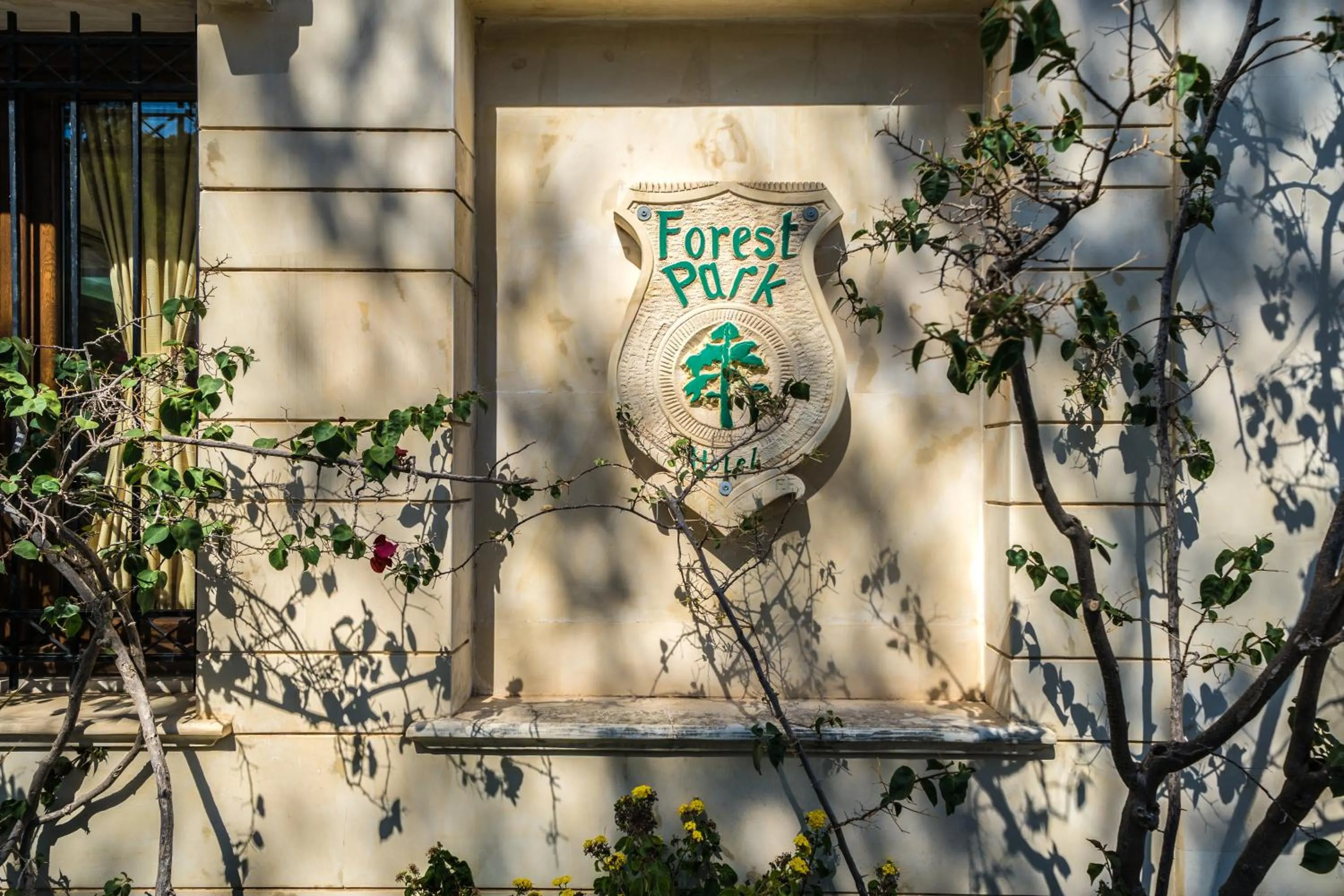 Property logo or sign in Forest Park Hotel