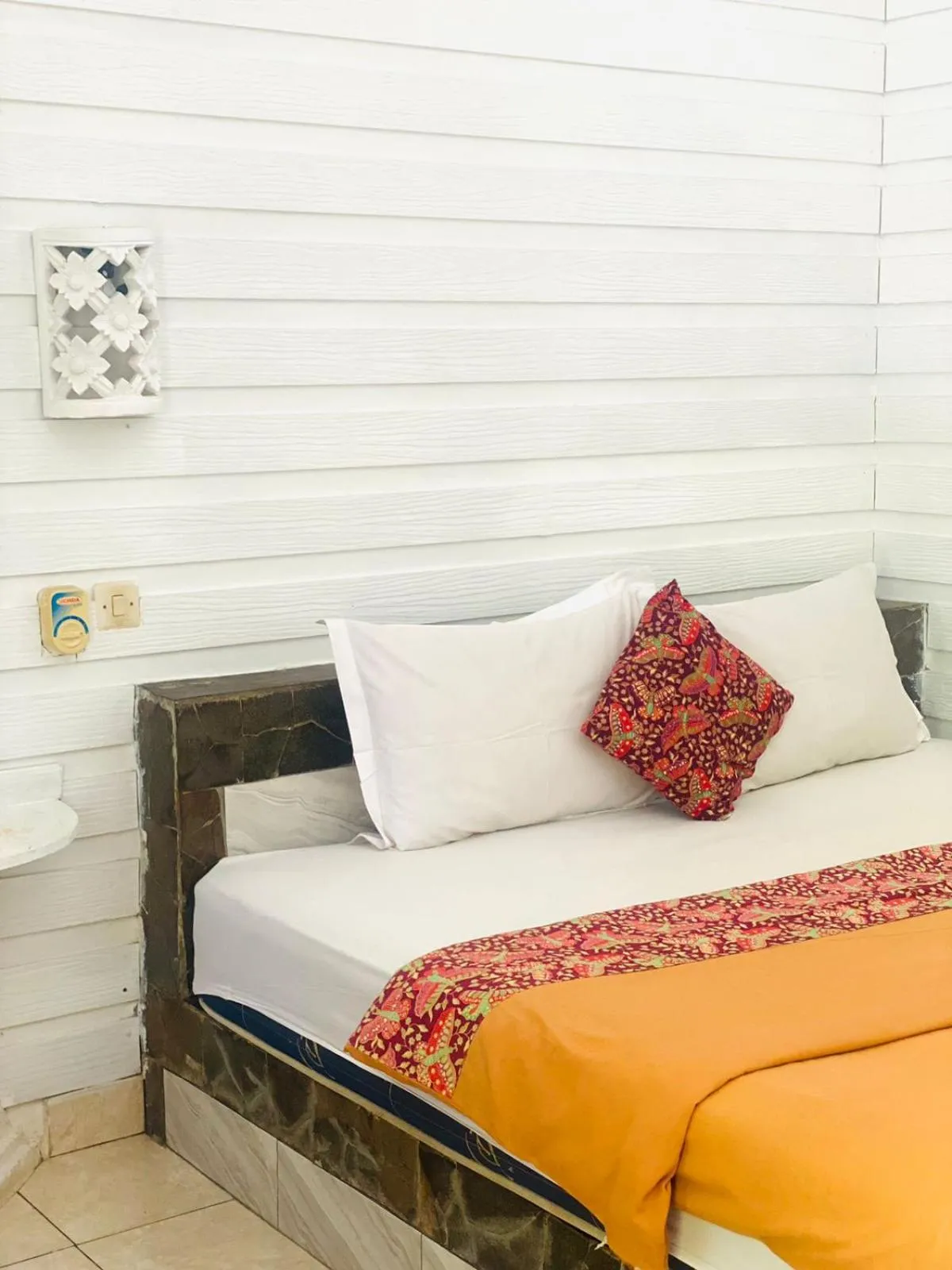 Bed in Tarci Bungalows Lembongan