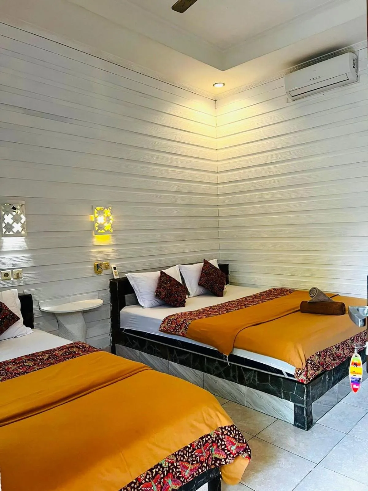 Bed in Tarci Bungalows Lembongan