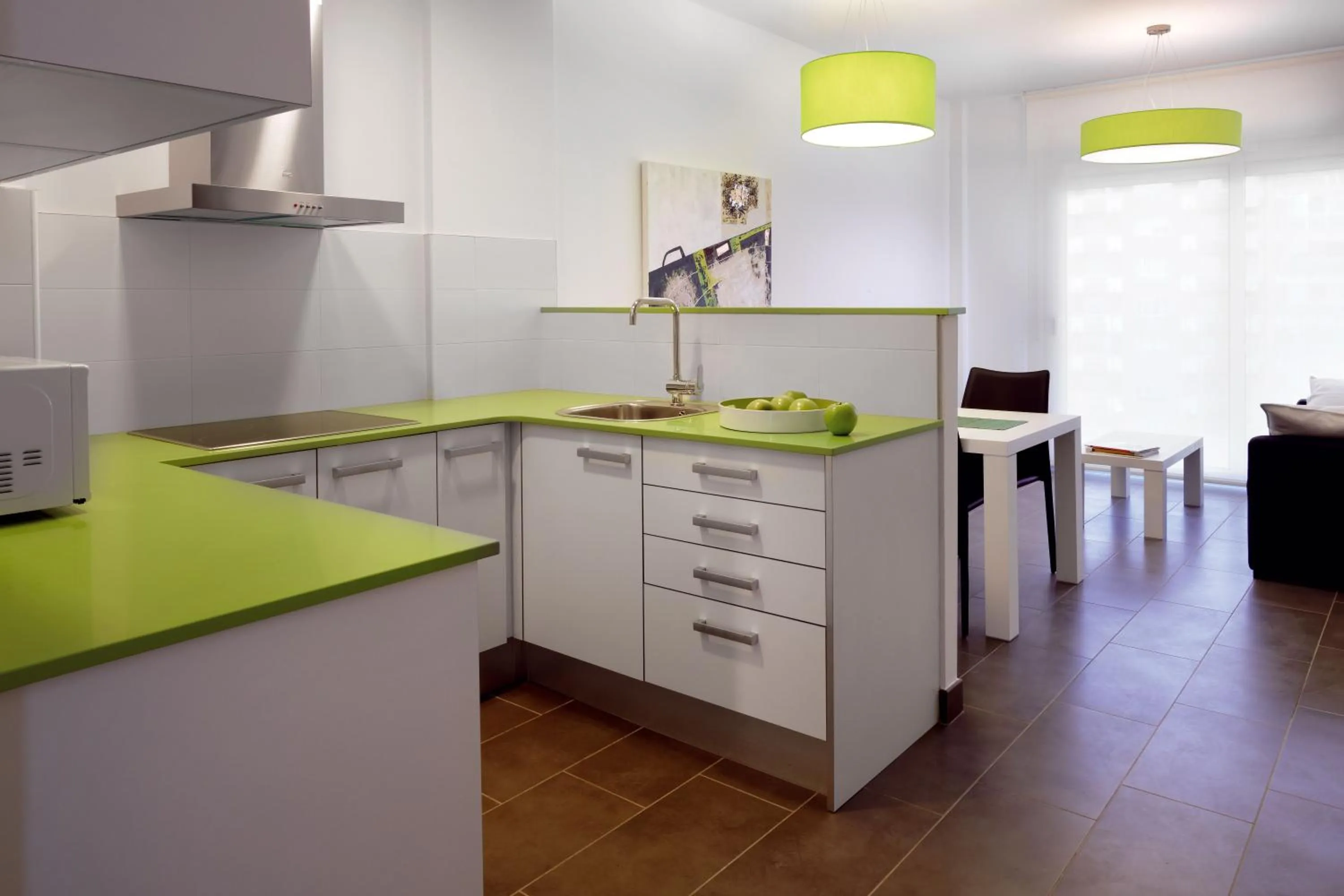 Kitchen or kitchenette in 08028 Apartments