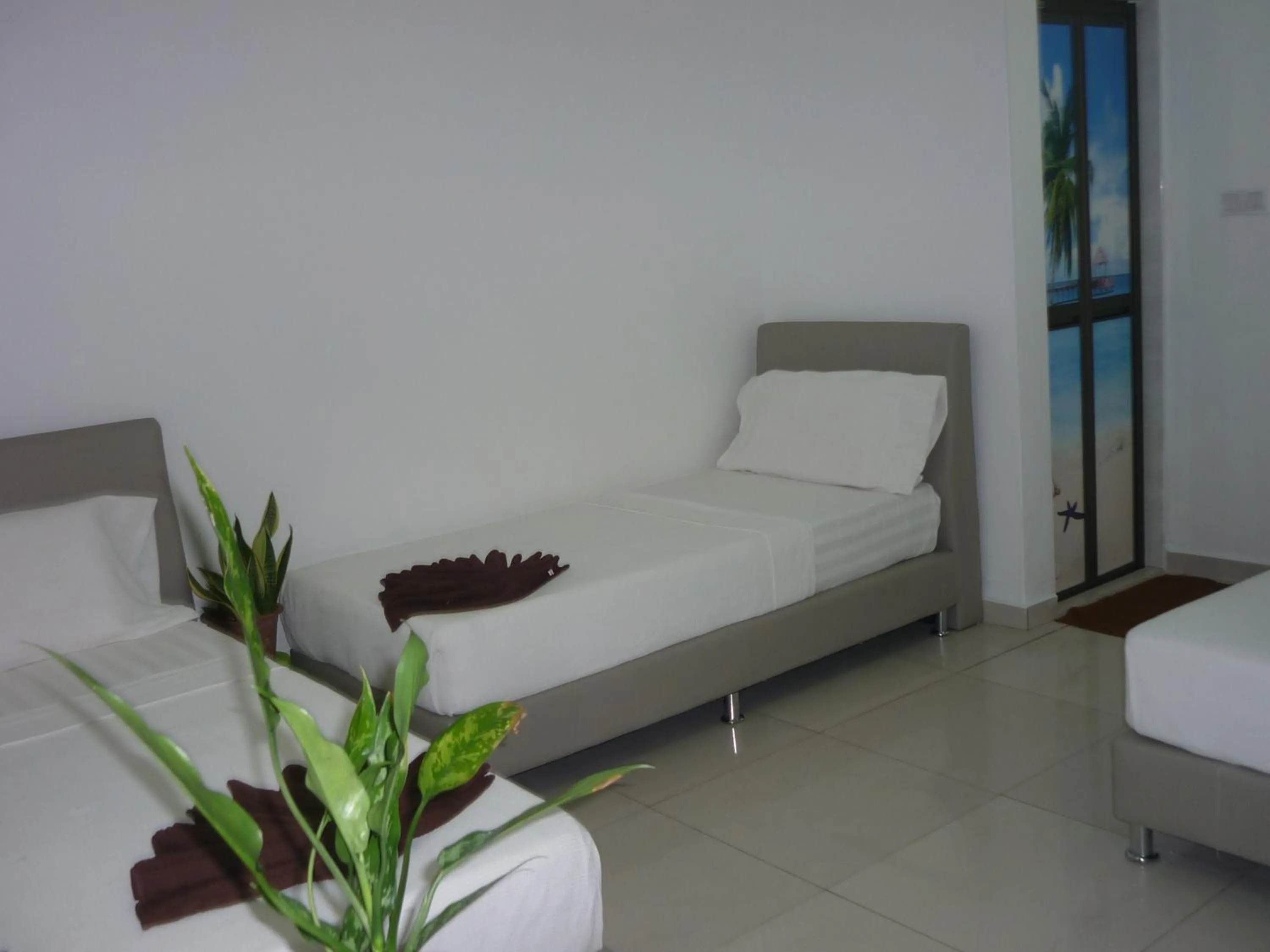 Bed in Hotel Paka INN