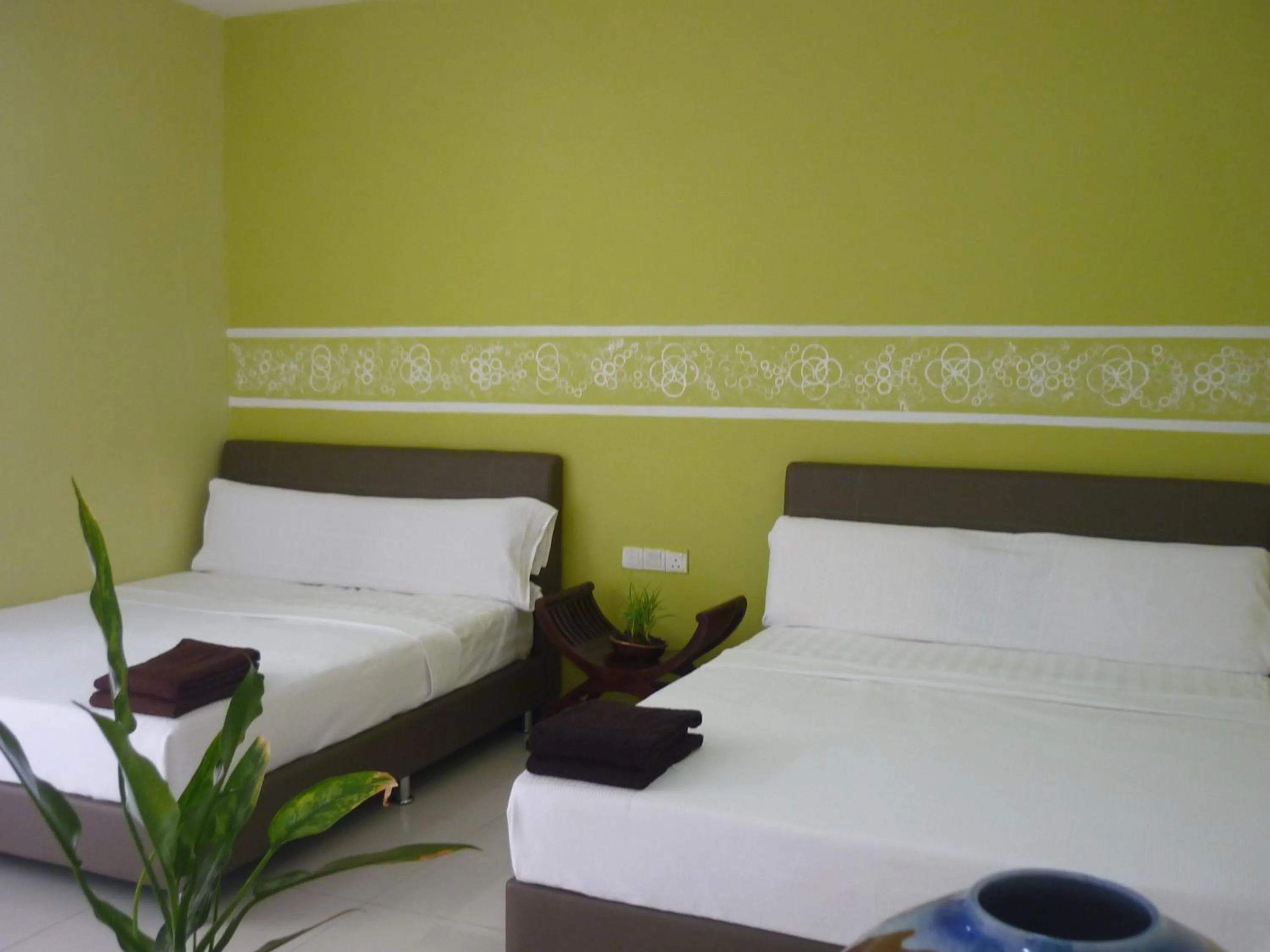 Bed in Hotel Paka INN