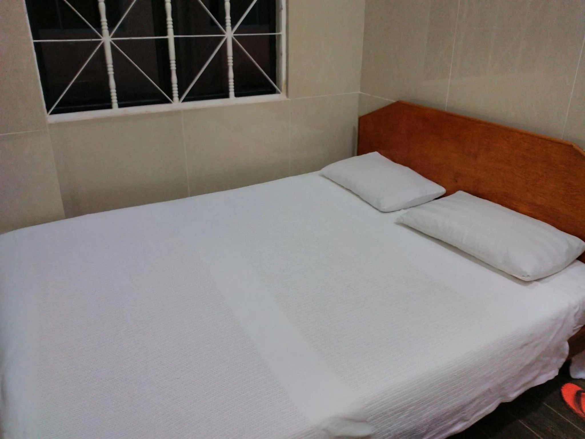 Photo of the whole room, Bed in Hotel Paka INN