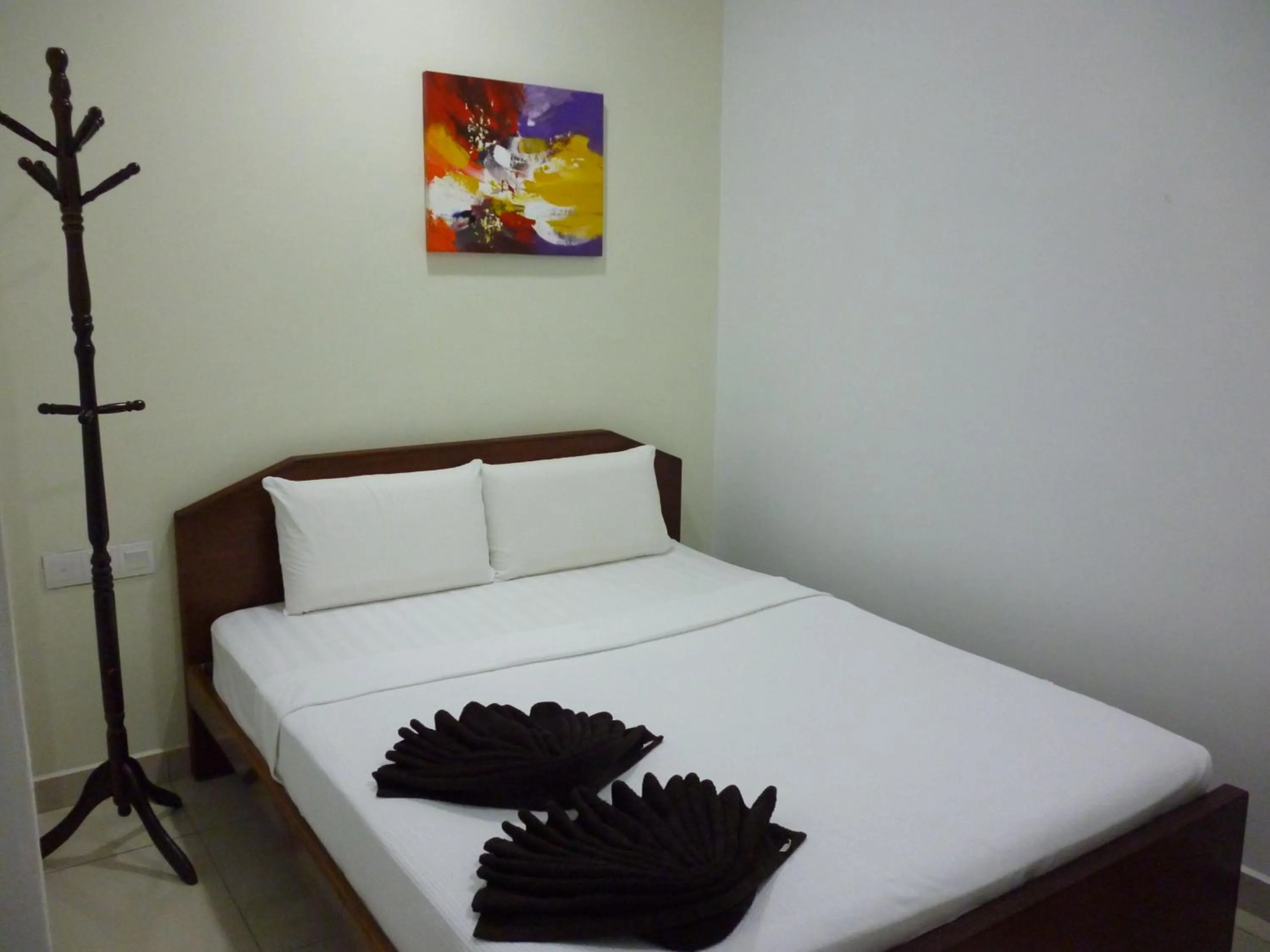 Bed in Hotel Paka INN