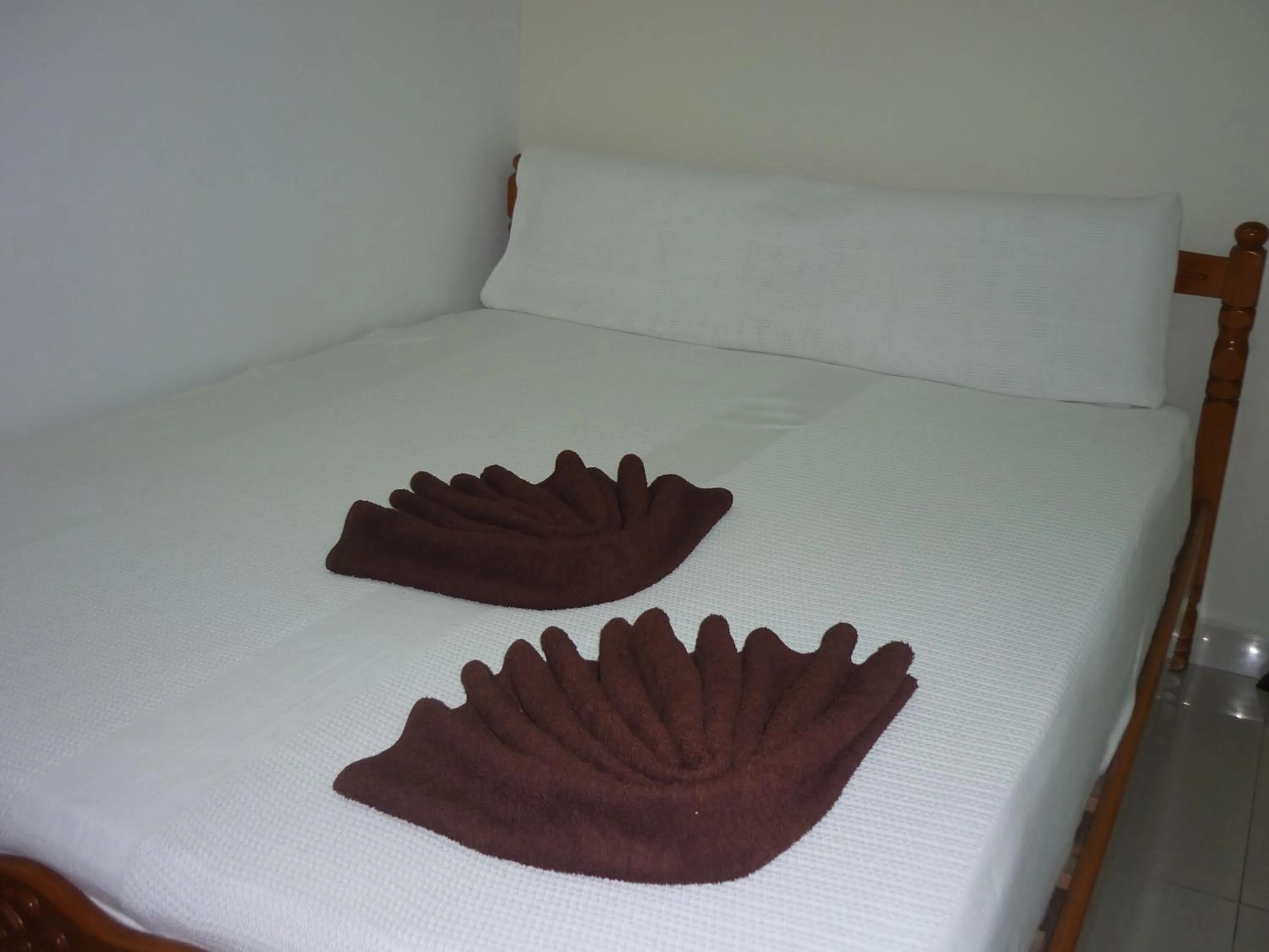 Bed in Hotel Paka INN