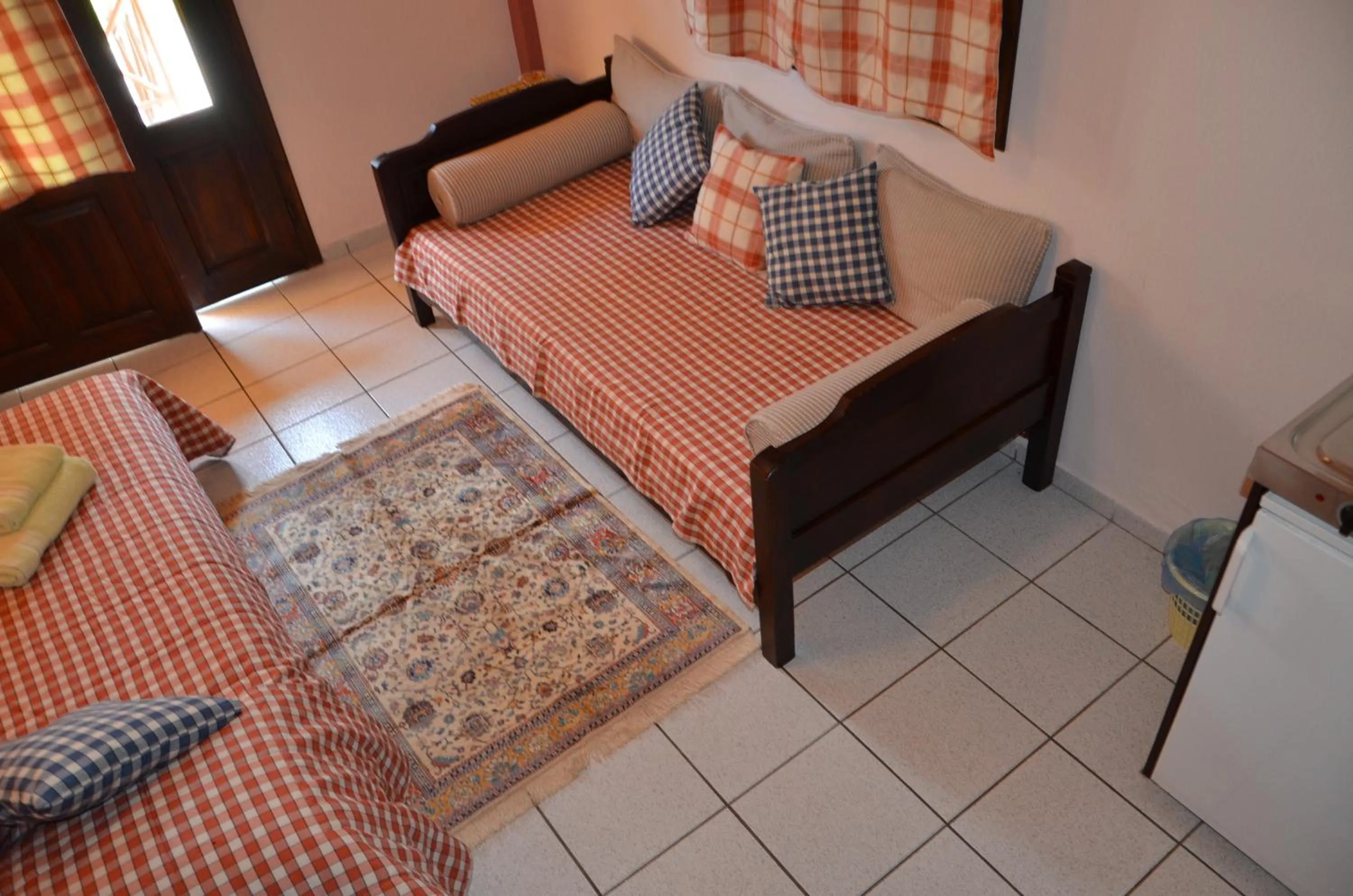 Seating area, Bed in Hotel Maria