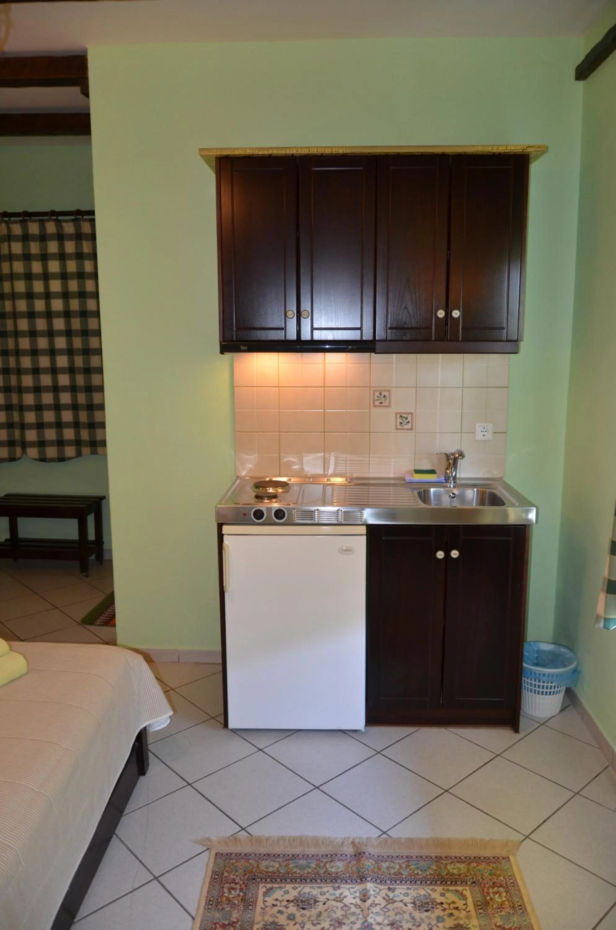 Kitchen or kitchenette in Hotel Maria