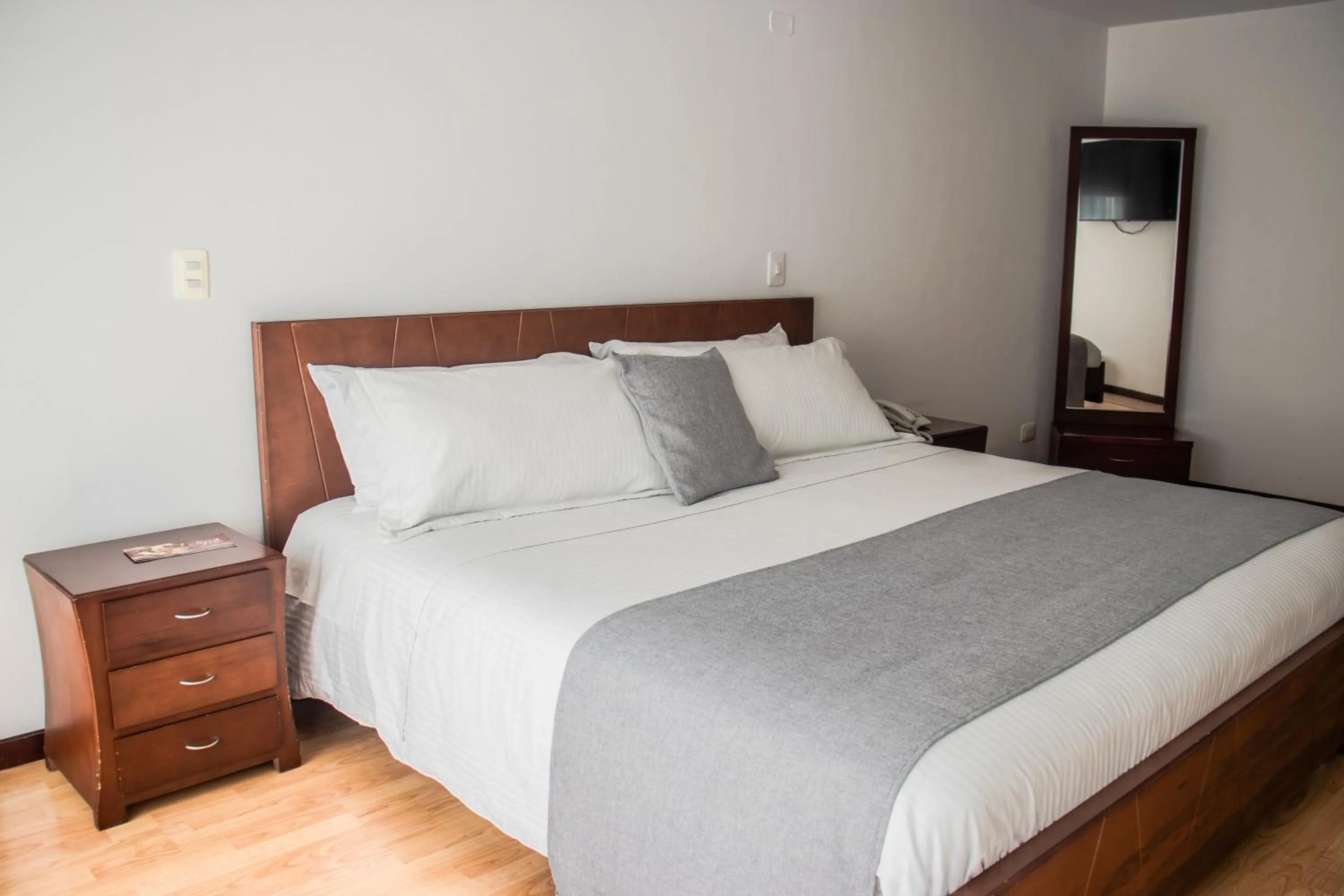 Bed in Nogal Suite Hotel Pasto