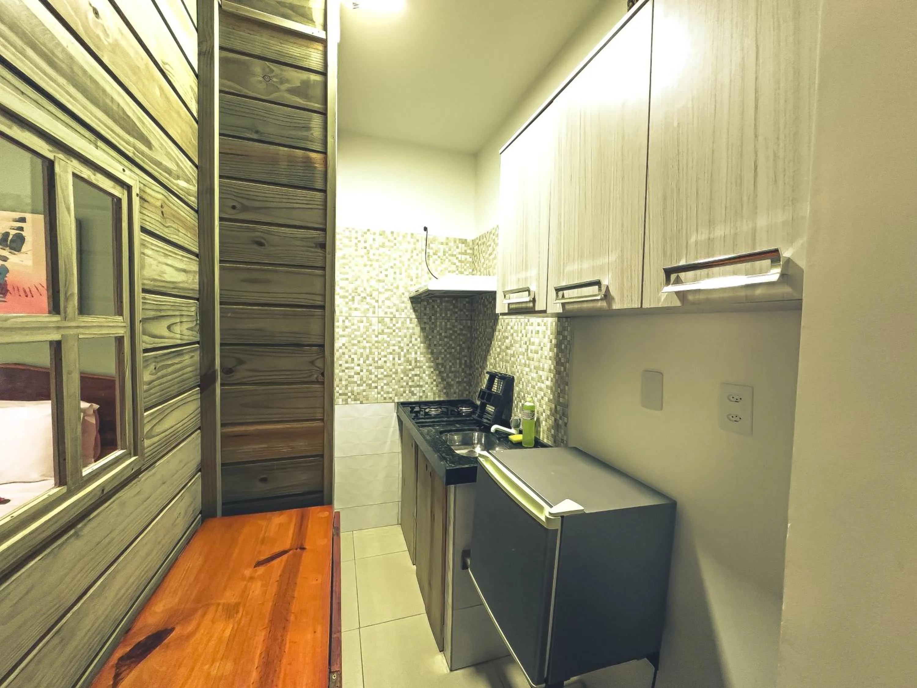 Kitchen or kitchenette in Igarakuê Flat