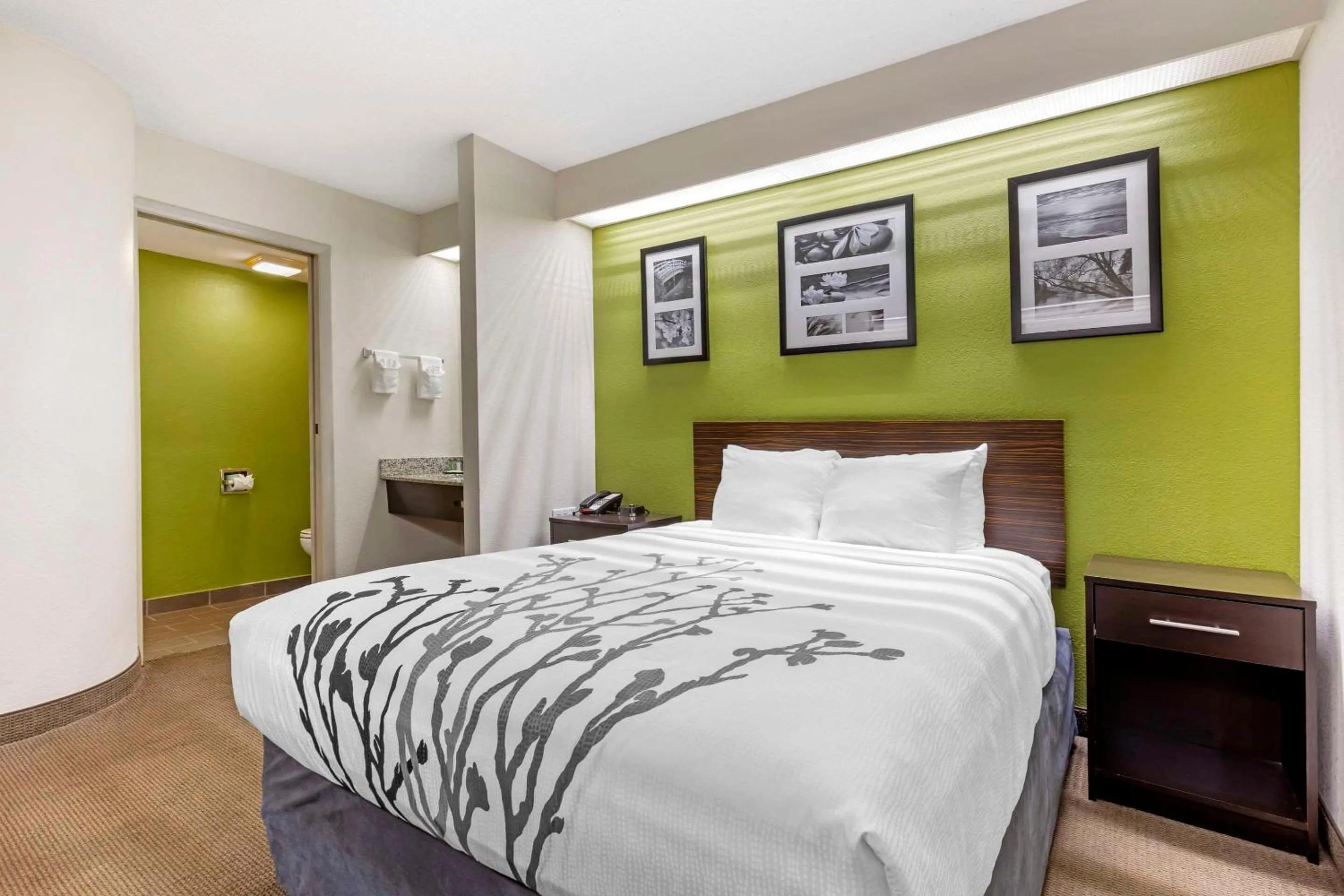 Bed in Sleep Inn at Greenville Convention Center