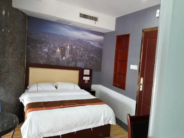 Bed in JUNYI Hotel Nanjing Olympic Sports Center