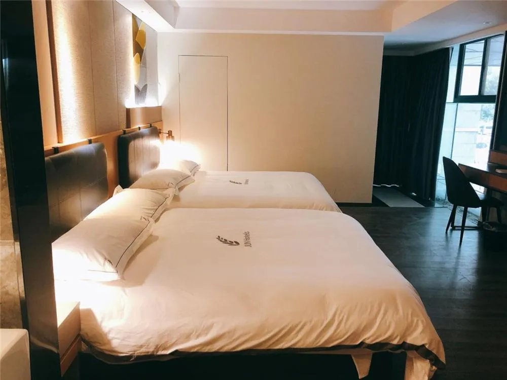 Bed in JUNYI Hotel Nanjing Olympic Sports Center
