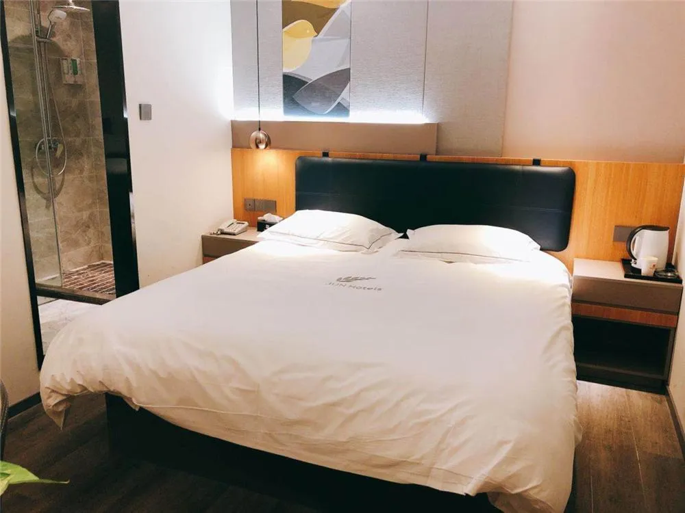Bed in JUNYI Hotel Nanjing Olympic Sports Center