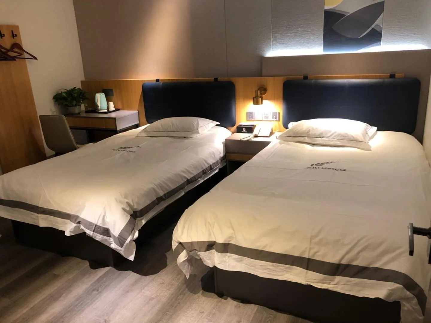 Bed in JUNYI Hotel Nanjing Olympic Sports Center