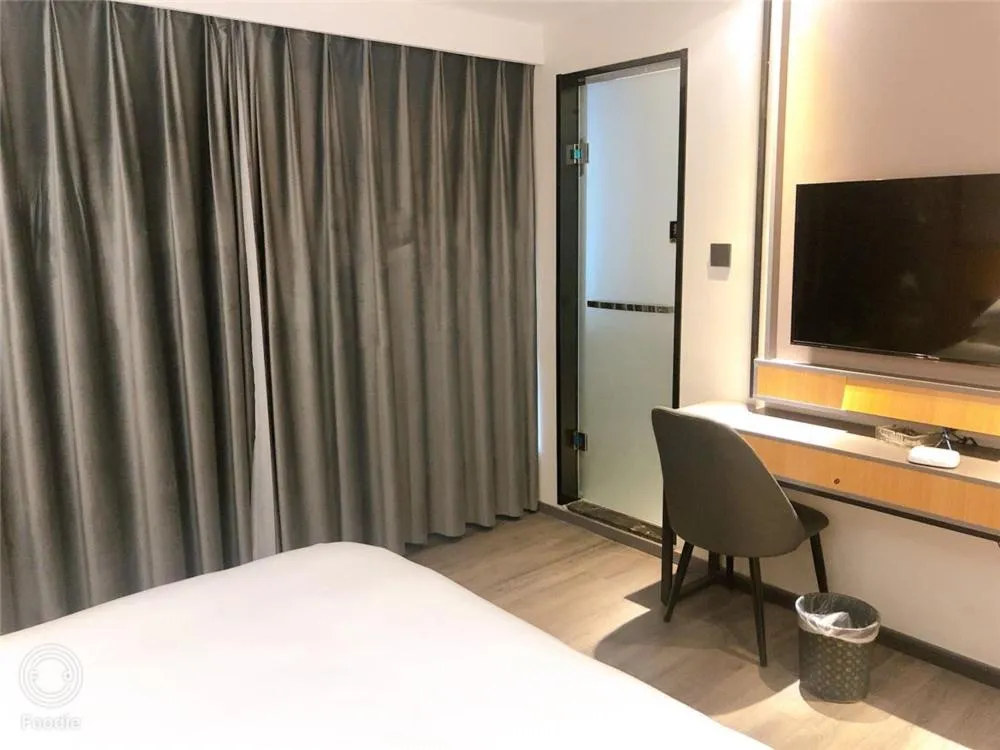 Bed in JUNYI Hotel Nanjing Olympic Sports Center