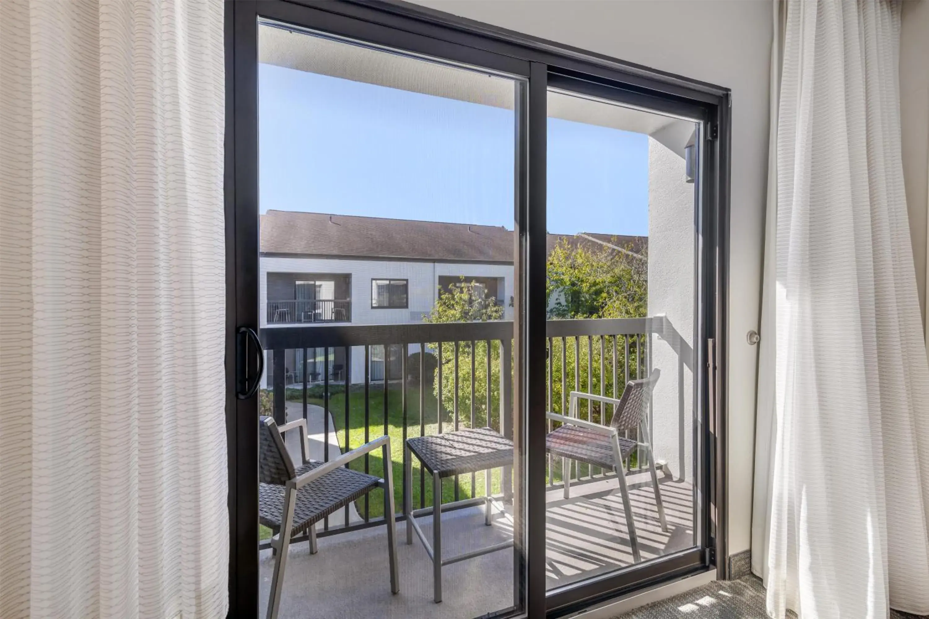 Deluxe King with Balcony in Sonesta Select Newport Middletown Deluxe King with Balcony in Sonesta Select Newport Middletown