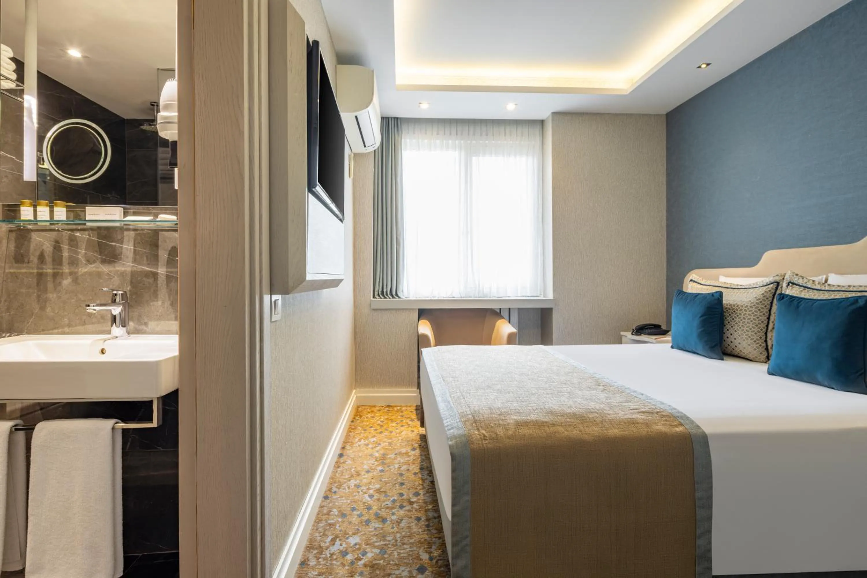 Bed in AHC Old City Hotel