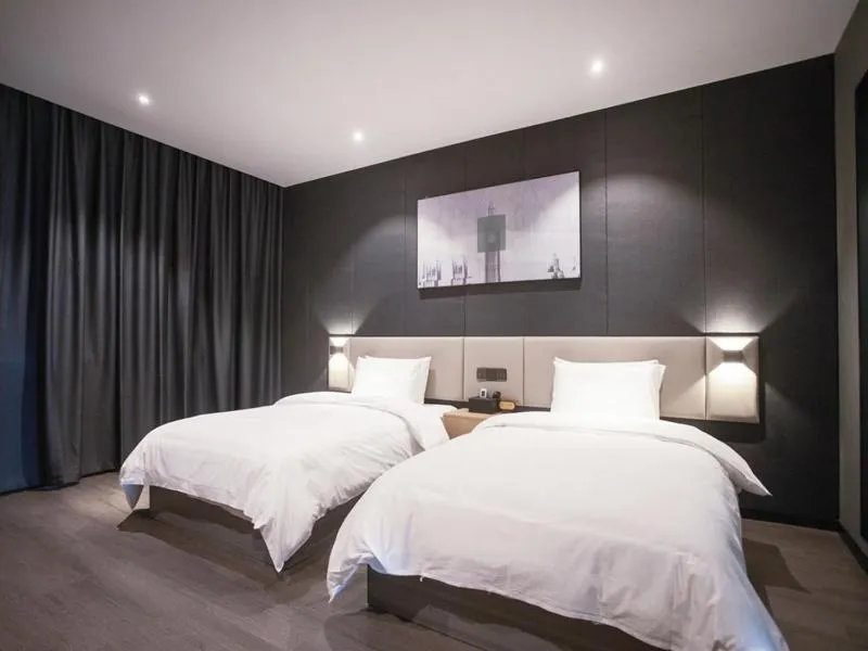 Bed in Thank Inn Chain Hotel Hunan Huaihua Hecheng District South High Speed Rail Station