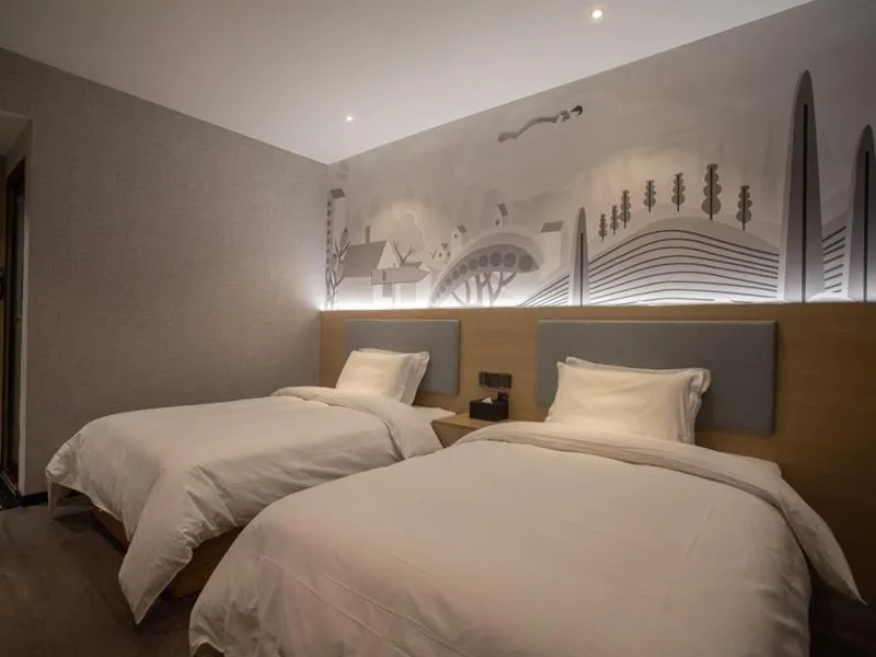Bed in Thank Inn Chain Hotel Hunan Huaihua Hecheng District South High Speed Rail Station
