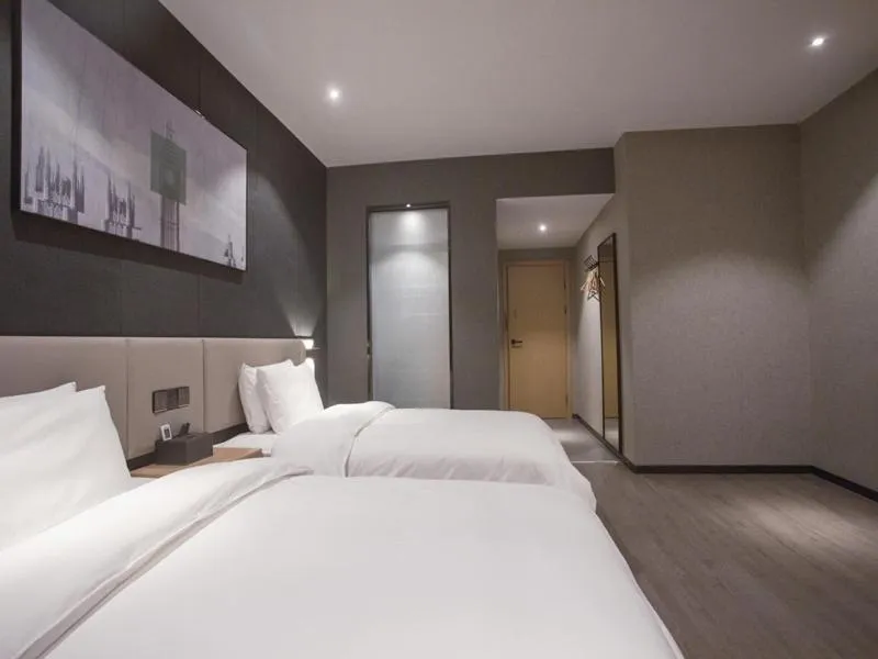 Bed in Thank Inn Chain Hotel Hunan Huaihua Hecheng District South High Speed Rail Station