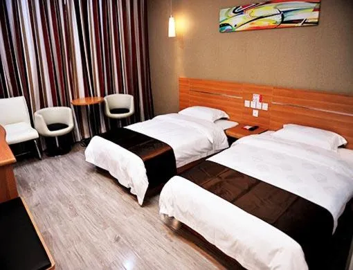 Bed in Thank Inn Chain Hotel Yunnan Lijiang Old Town South Gate