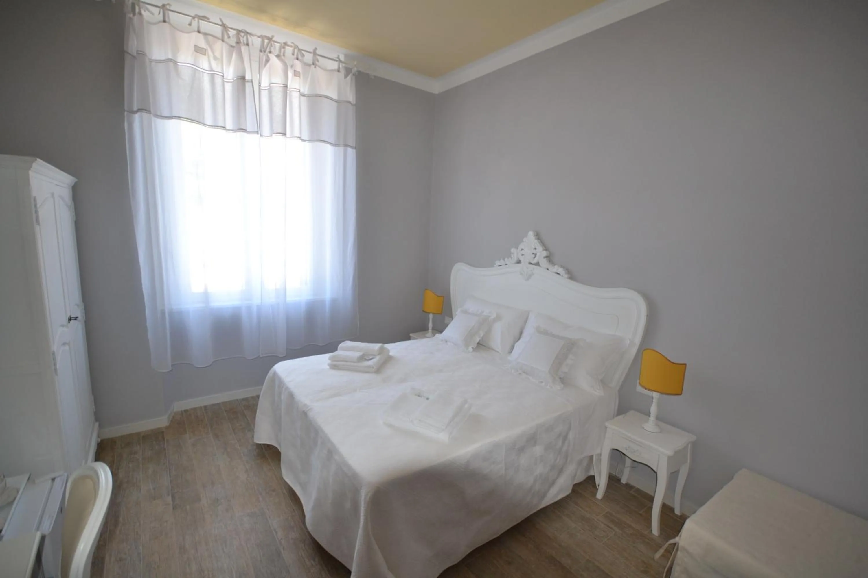 Decorative detail, Bed in Affittacamere Casa Dane'