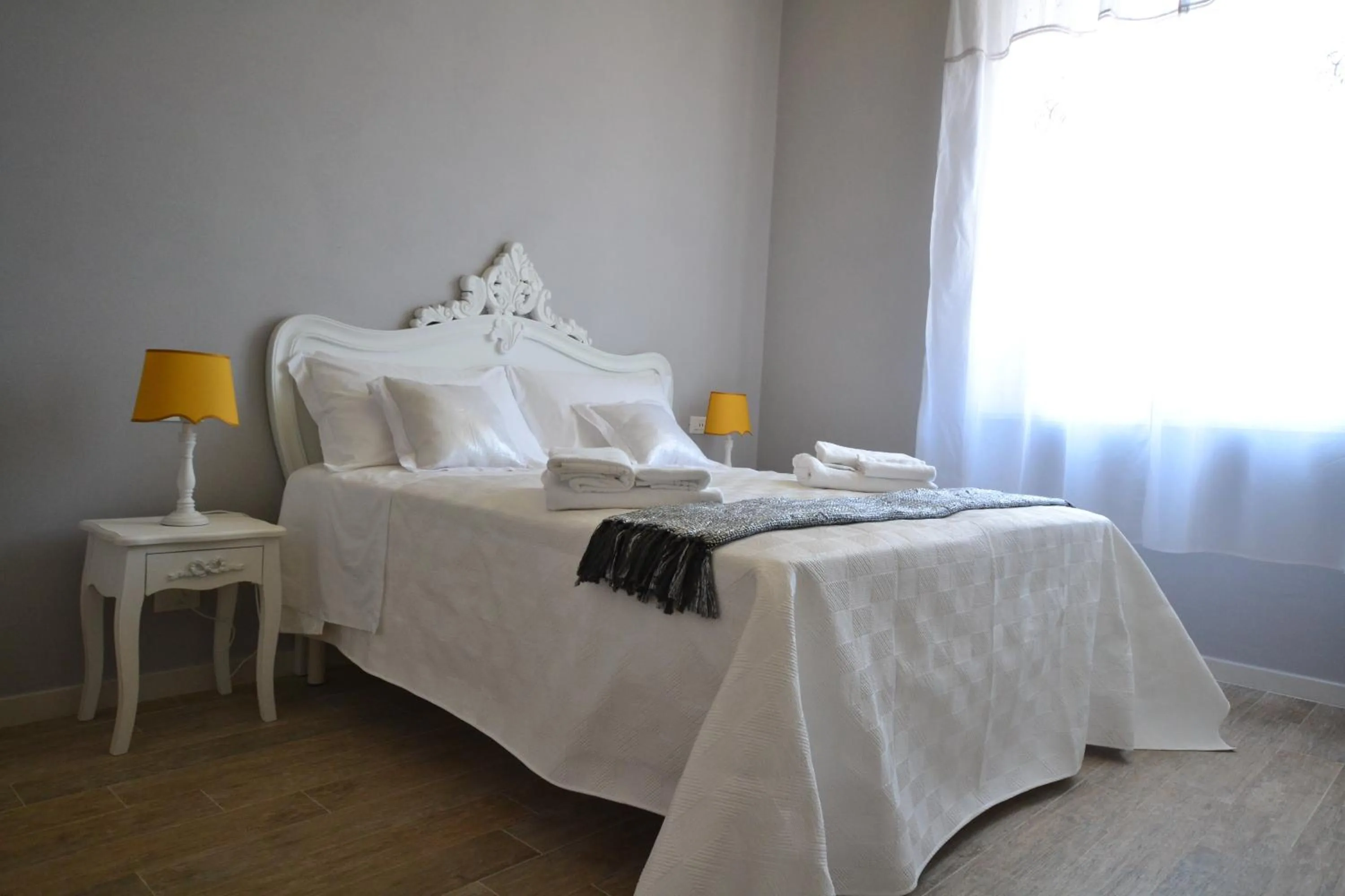 Decorative detail, Bed in Affittacamere Casa Dane'