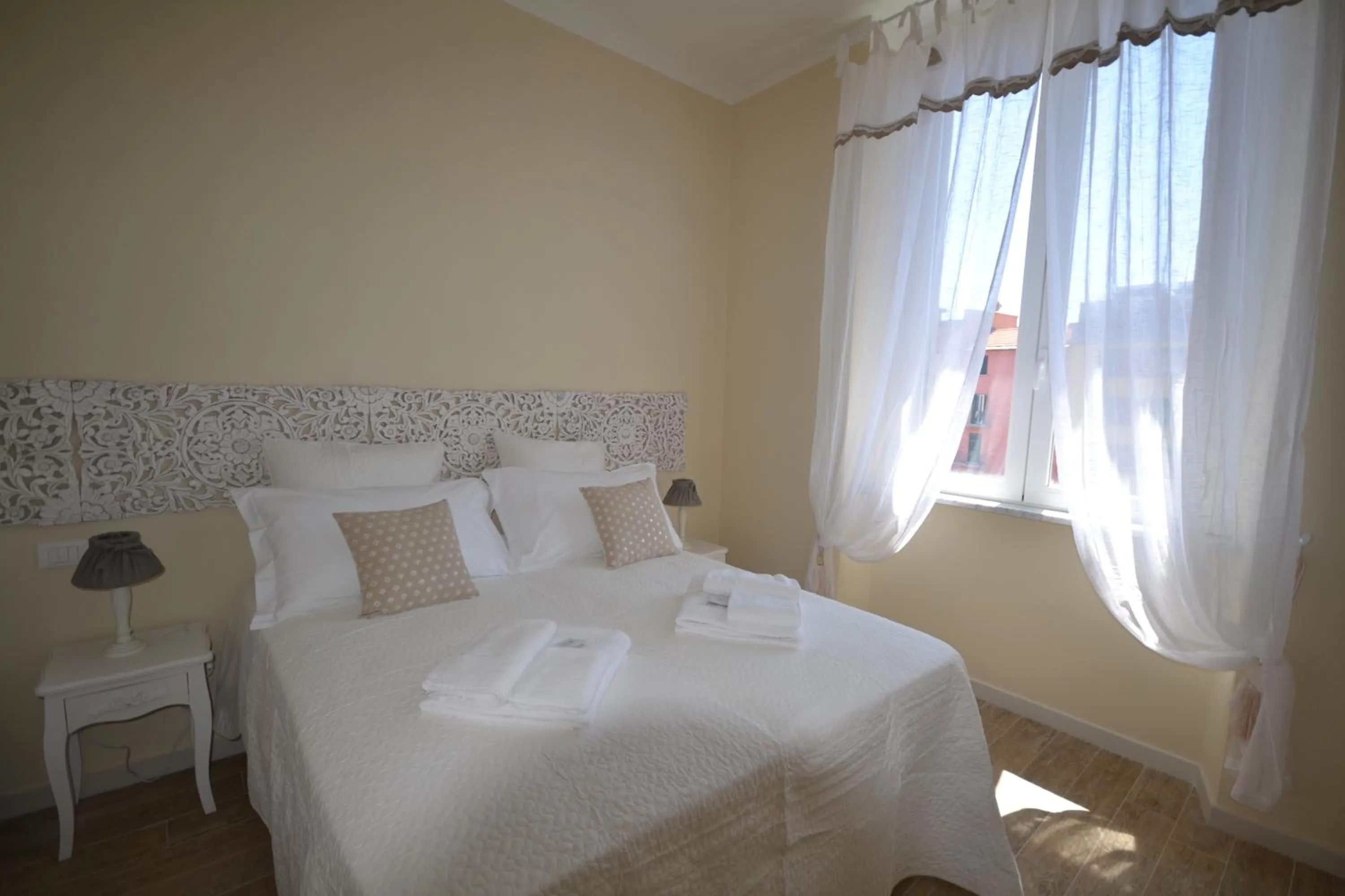 Decorative detail, Bed in Affittacamere Casa Dane'