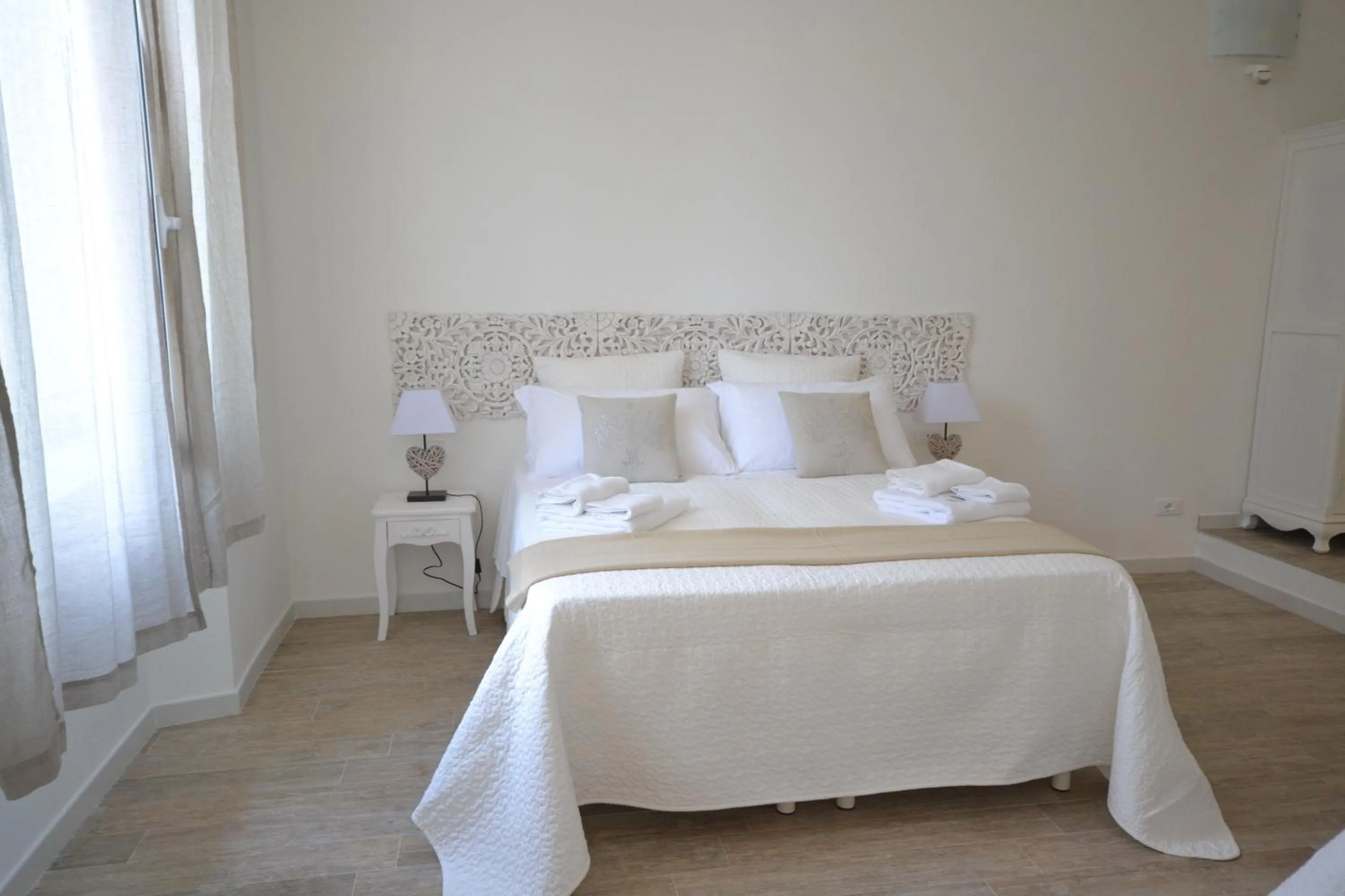 Decorative detail, Bed in Affittacamere Casa Dane'