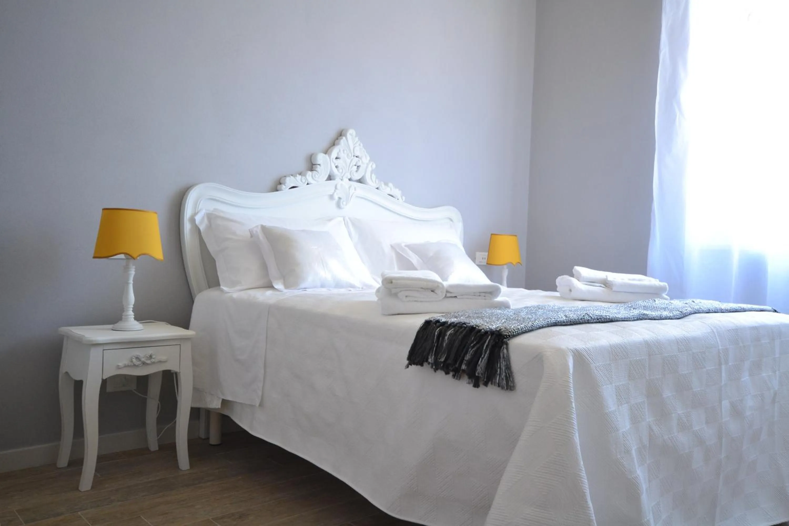 Decorative detail, Bed in Affittacamere Casa Dane'